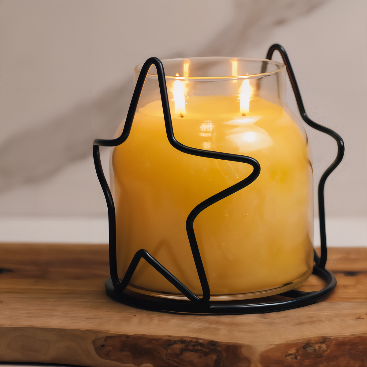 A Cheerful Giver Star Candle Jar Holder -- styled scene with candle