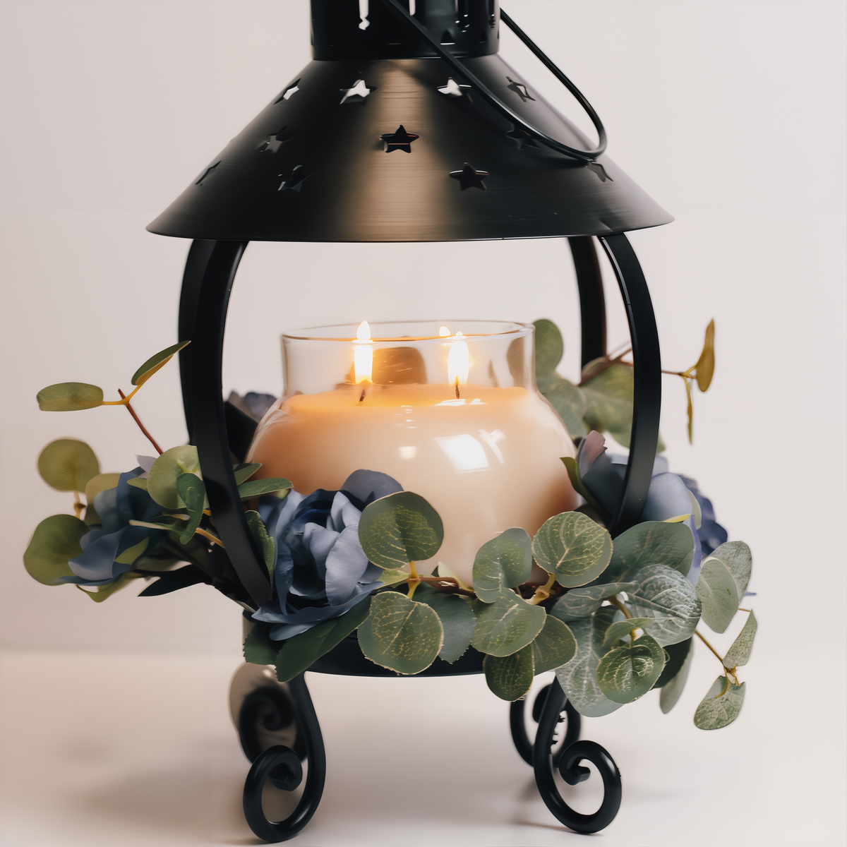 A Cheerful Giver Star Candle Lantern -- styled scene with candle