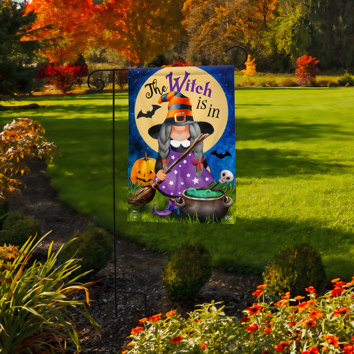 Briarwood Lane The Witch Is In Halloween Garden Flag -- garden flag displayed outdoors