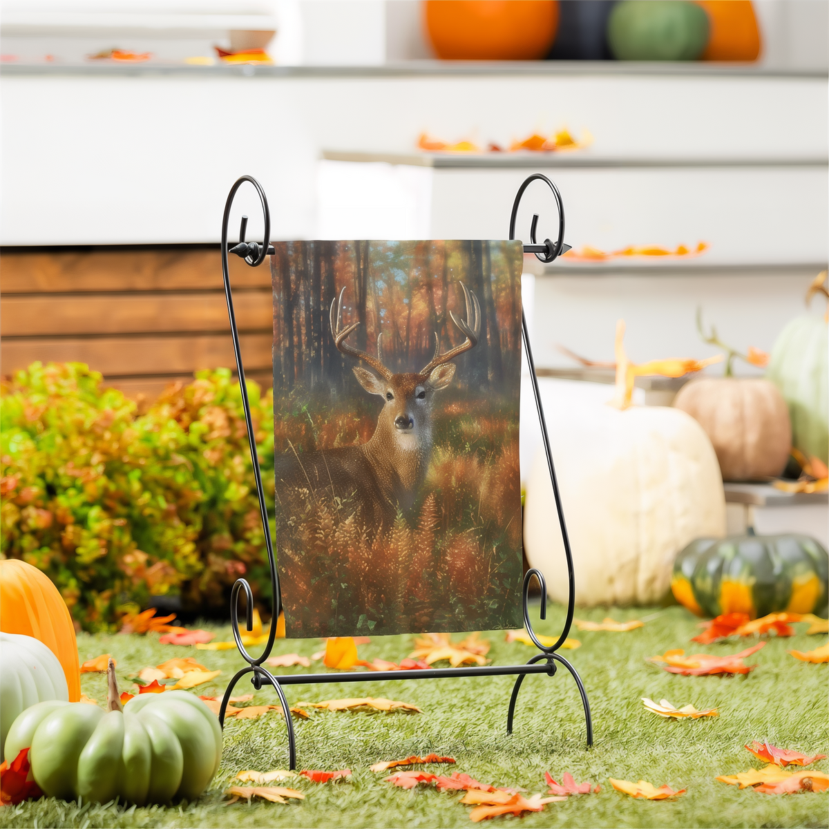 Evergreen Gazing Autumn Buck Suede Garden Flag -- displayed outdoors beside fall pumpkins