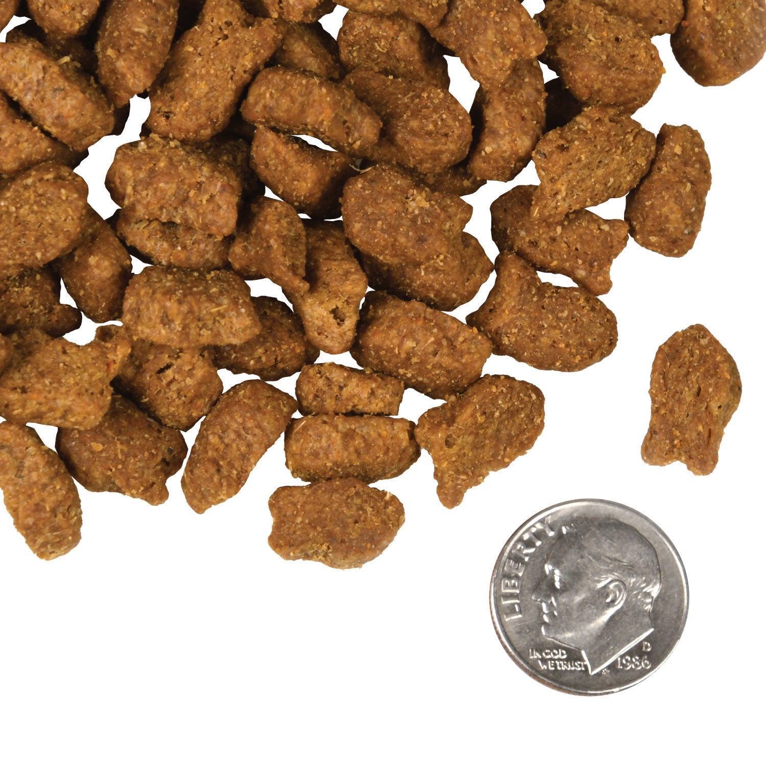 A small pile of Fromm Four-Star Trout & Whitefish fish-shaped kibble next to a dime for scale