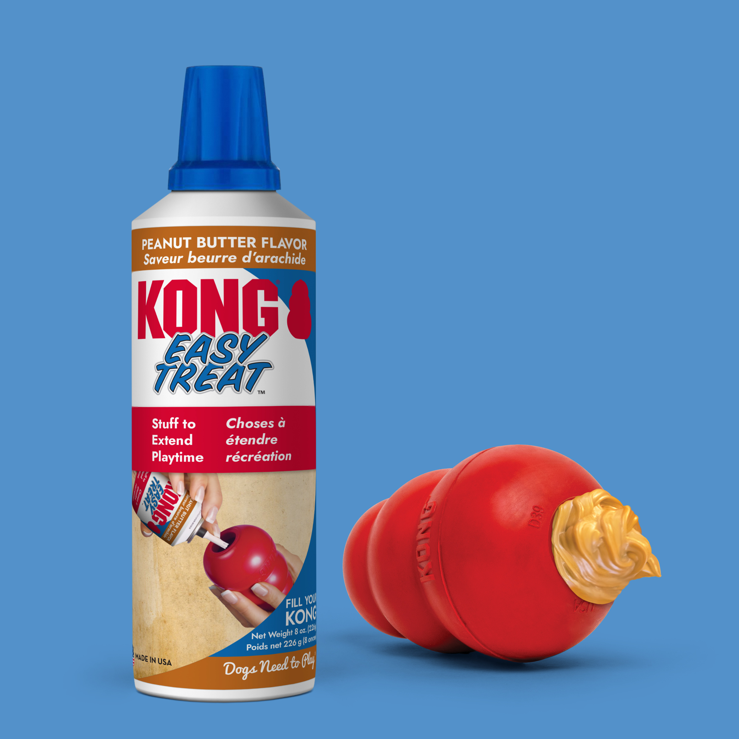 KONG Easy Treat Peanut Butter dispensed into a red KONG rubber toy