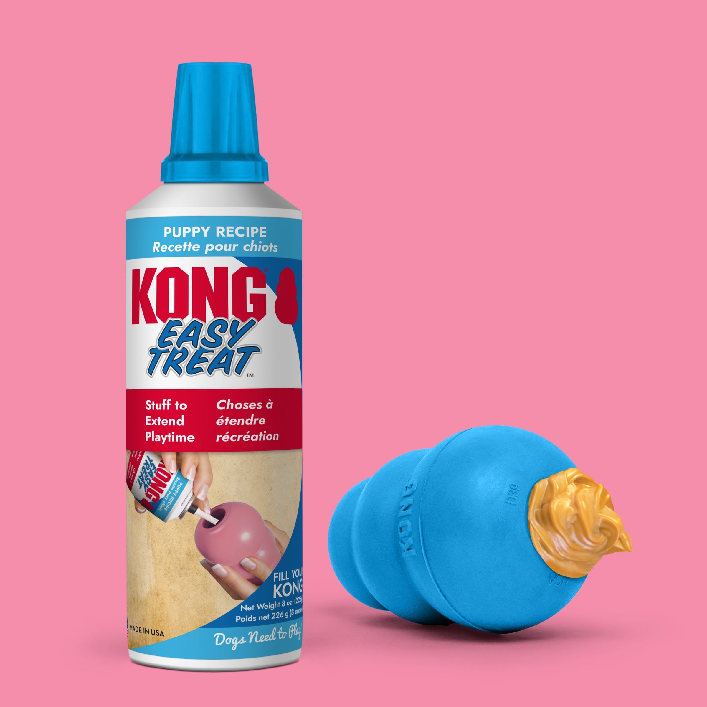 KONG Easy Treat Puppy can beside a treat-filled KONG rubber toy