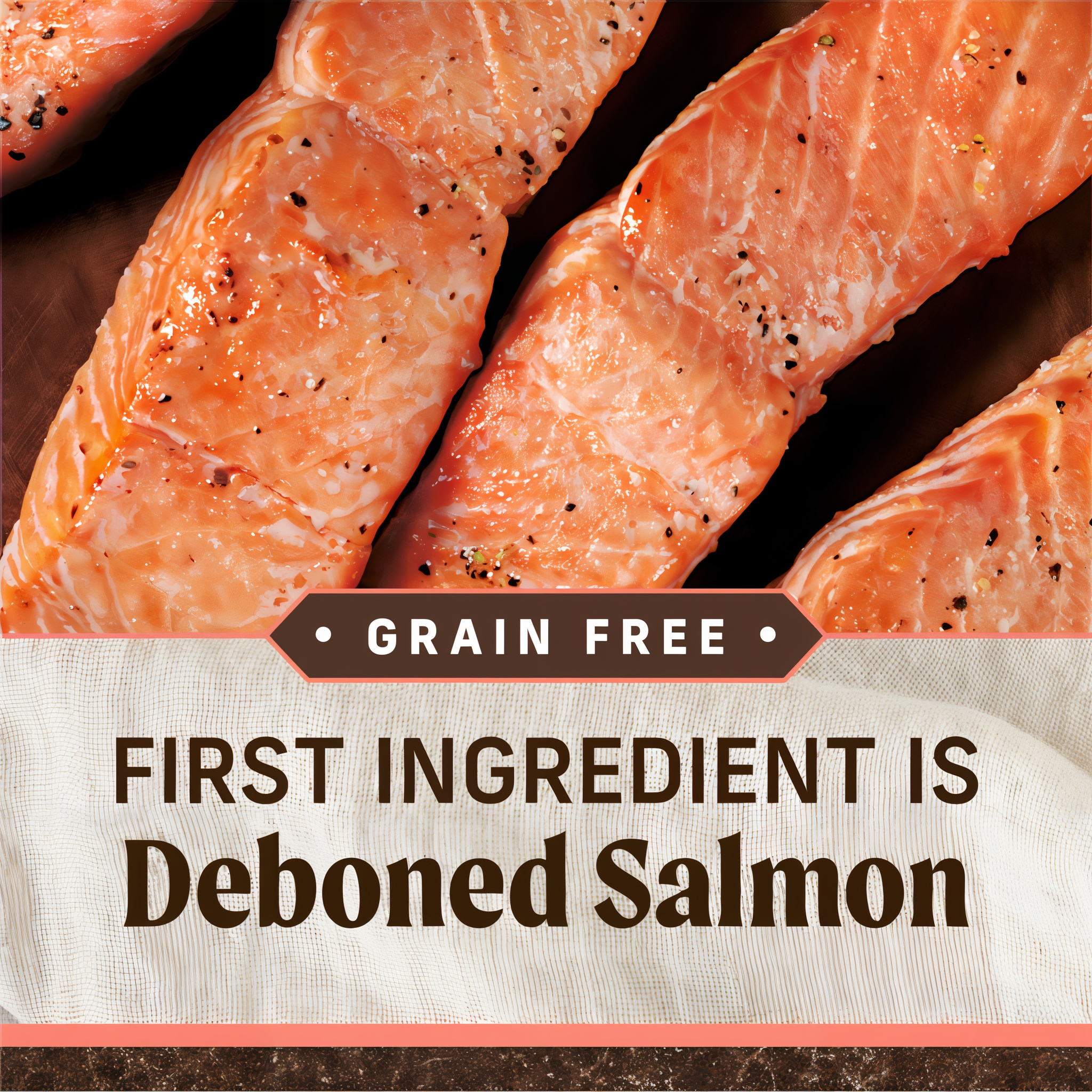Strips of cooked salmon with text noting grain free recipe with deboned salmon as the first ingredient