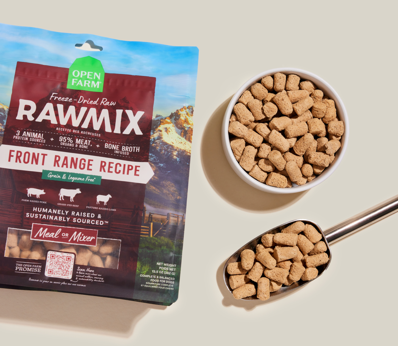 Open Farm RawMix Front Range freeze dried morsels in a bowl and measuring scoop