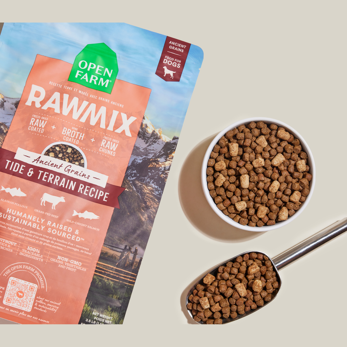 Open Farm RawMix Tide & Terrain Ancient Grains Dog Kibble -- bag with a bowl of kibble