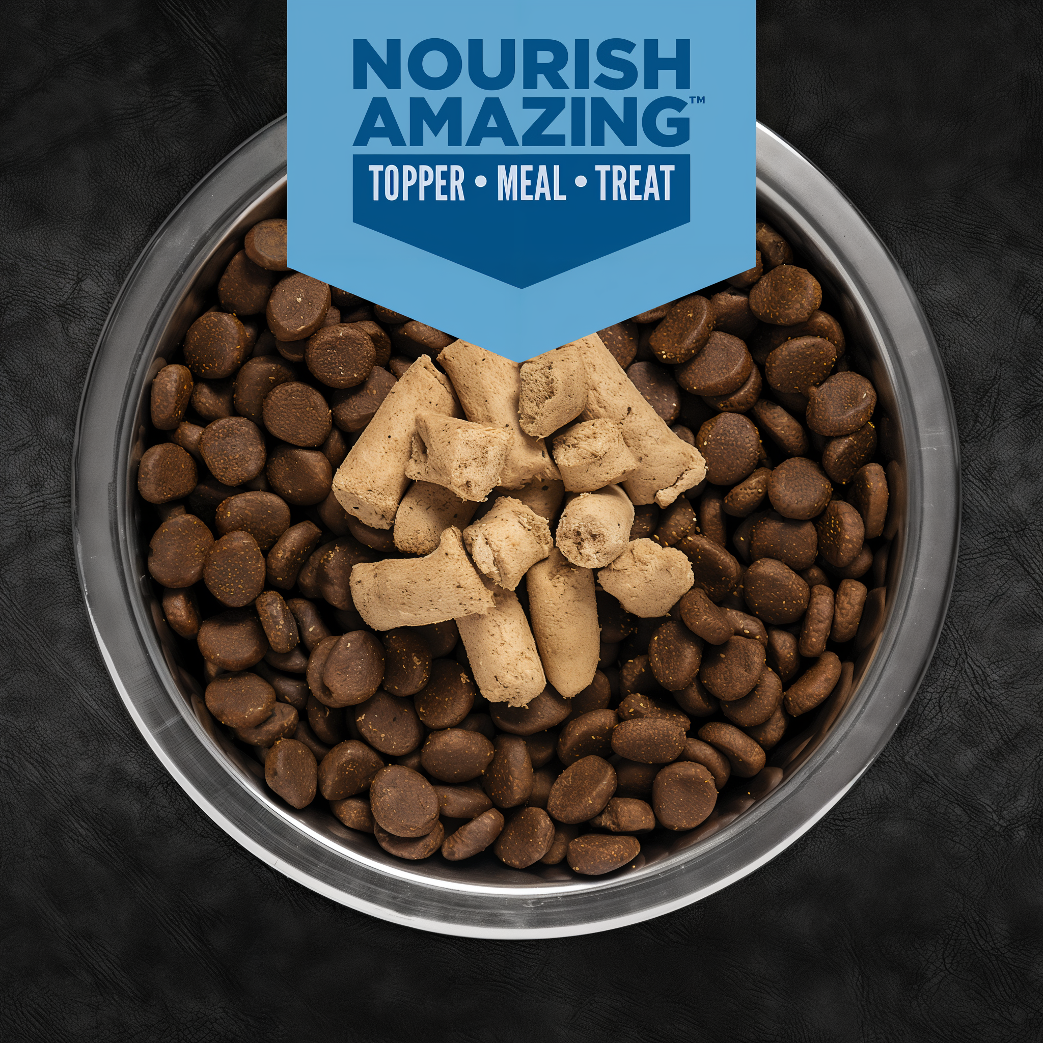 Bowl of Orijen kibble topped with freeze-dried Epic Bites Original, served as a topper, meal or treat