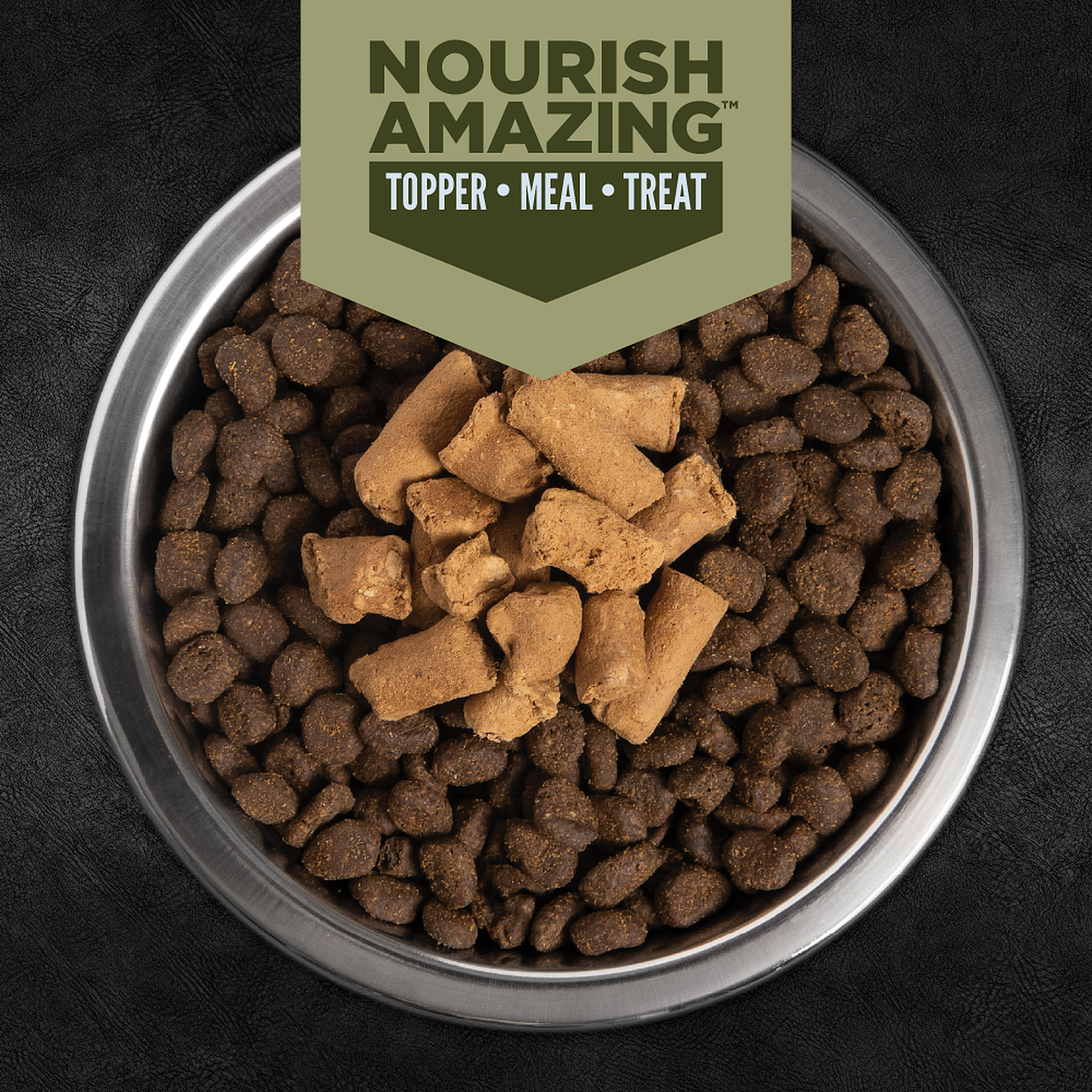ORIJEN Tundra Epic Bites freeze-dried bites served over ORIJEN dry kibble in a bowl as a meal topper, treat or standalone meal