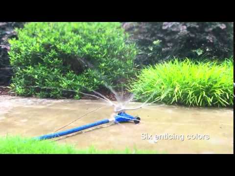 Dramm ColorStorm Whirling Sprinkler in action — 3-arm rotating spray pattern demo