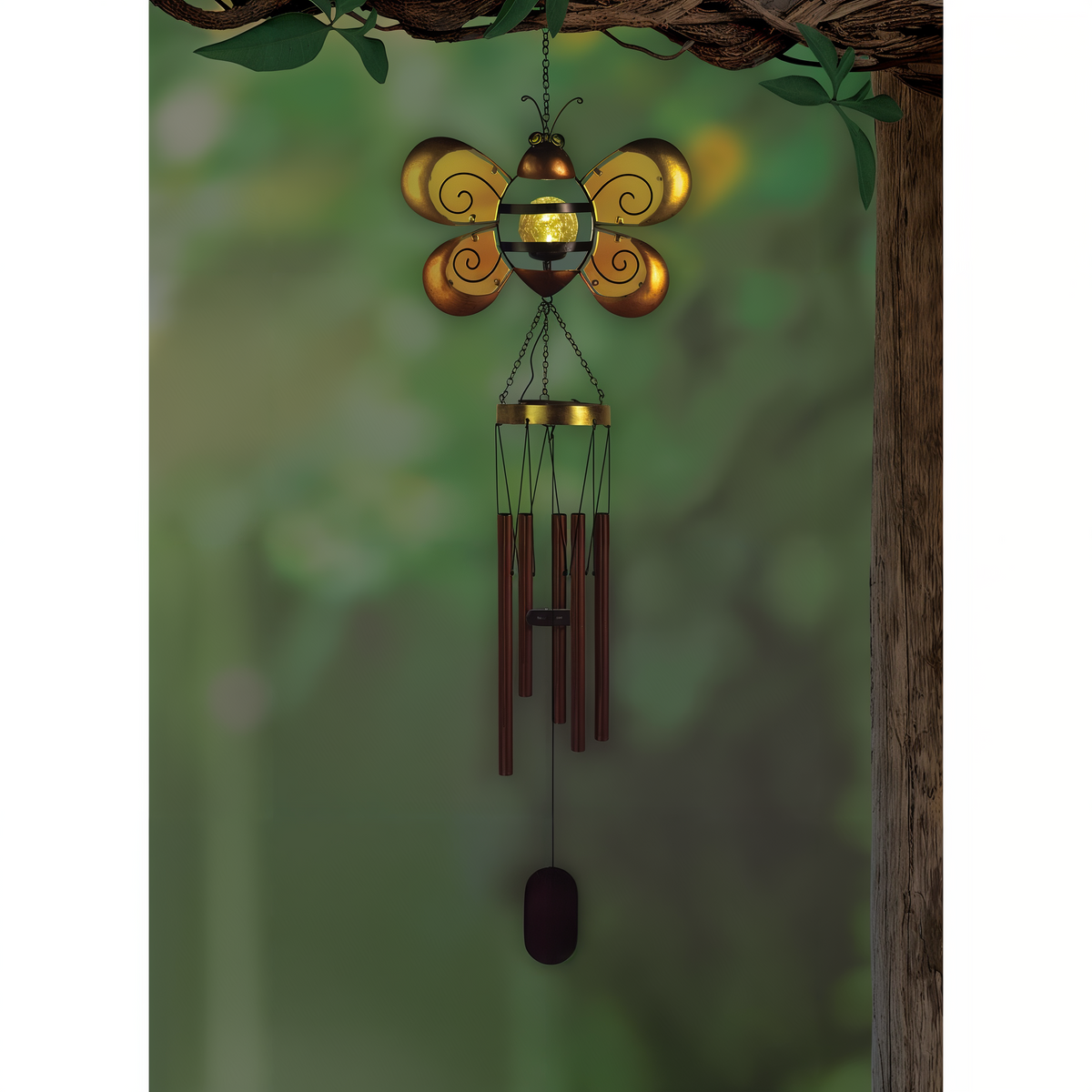 Sunset Vista Designs Solar Bee Wind Chime -- shown glowing at dusk in a garden