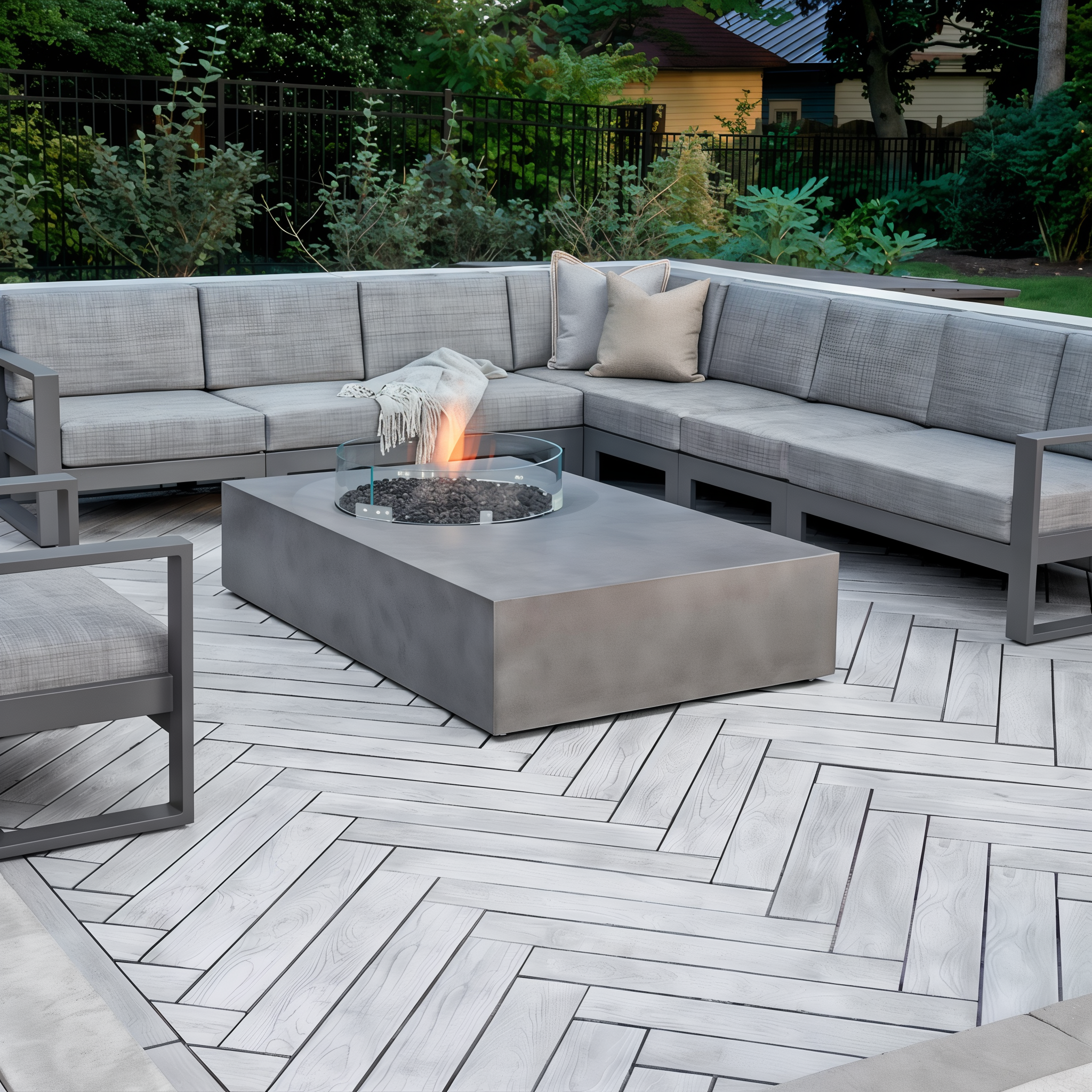 Outdoor seating area by the fire with Borealis Riviera paver slabs, 10 x 30