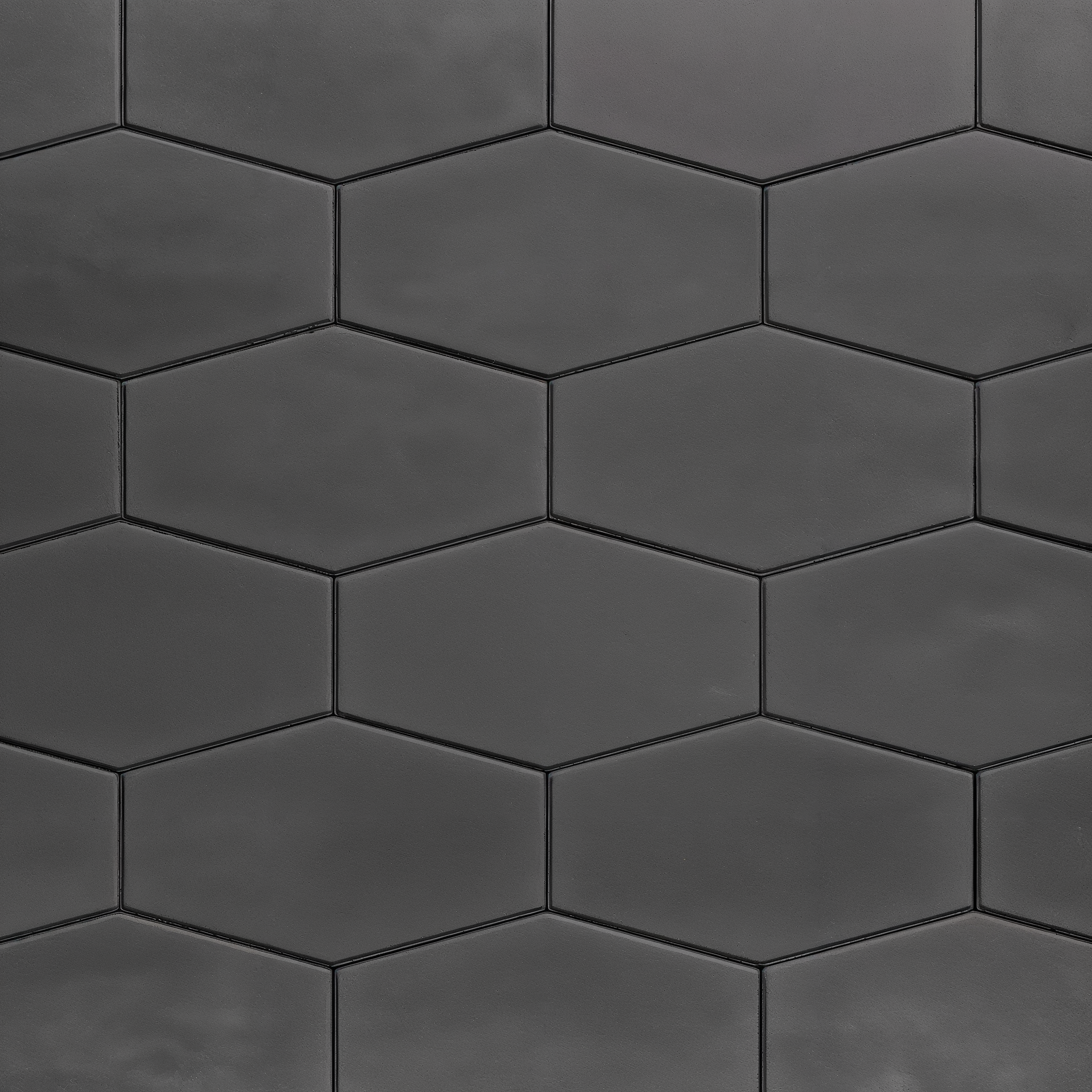 Close-up of Hexa 60 Slabs in Onyx Black with smooth texture and narrow joints.