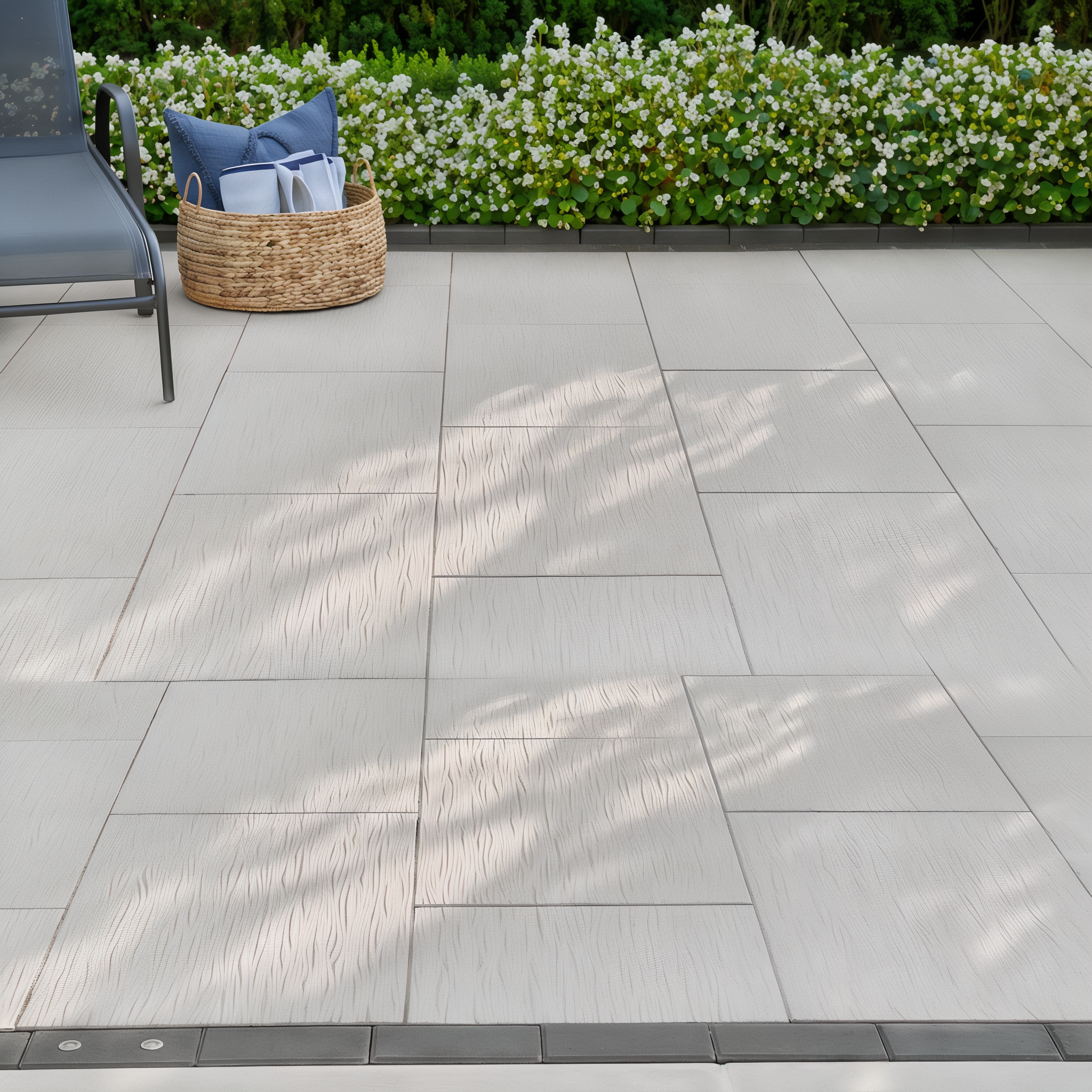 Ocean Grande paver slabs by Techo-Bloc in Beige Cream HD² Ocean Wave, displayed outdoors.