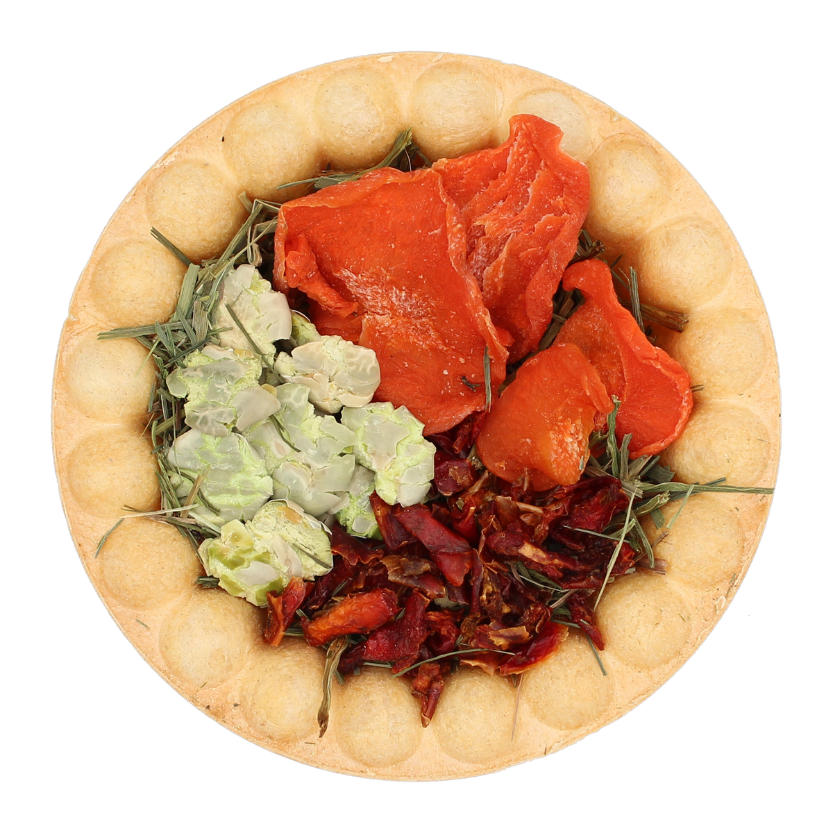 Vitakraft Veggie Pie closeup with dried carrots peas and red peppers on Timothy hay in baked crust