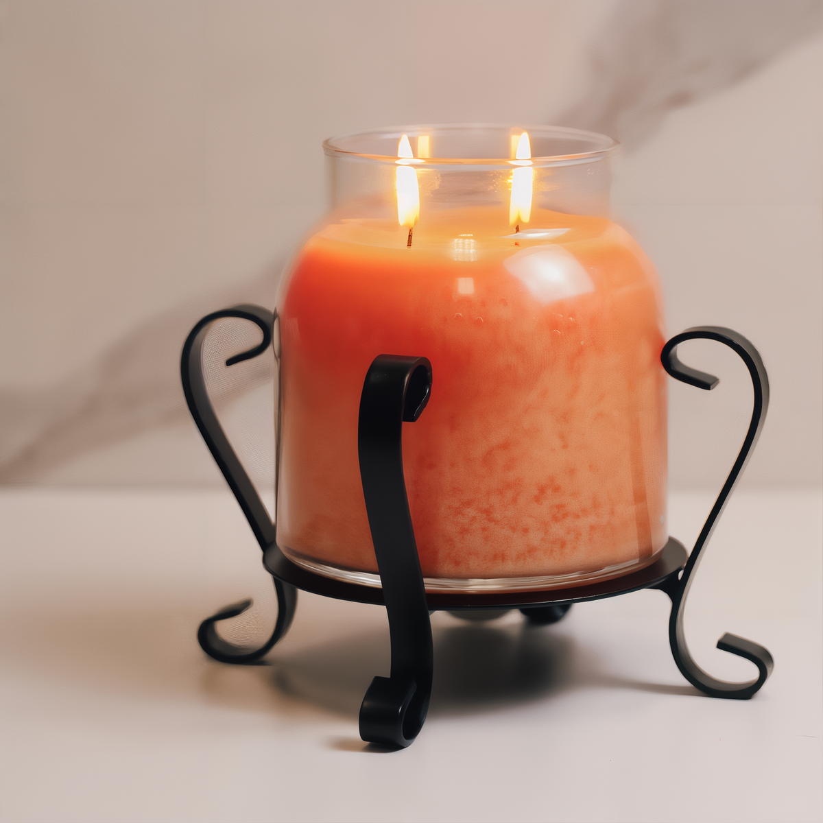 A Cheerful Giver Black Candle Jar Holder -- styled scene with candle