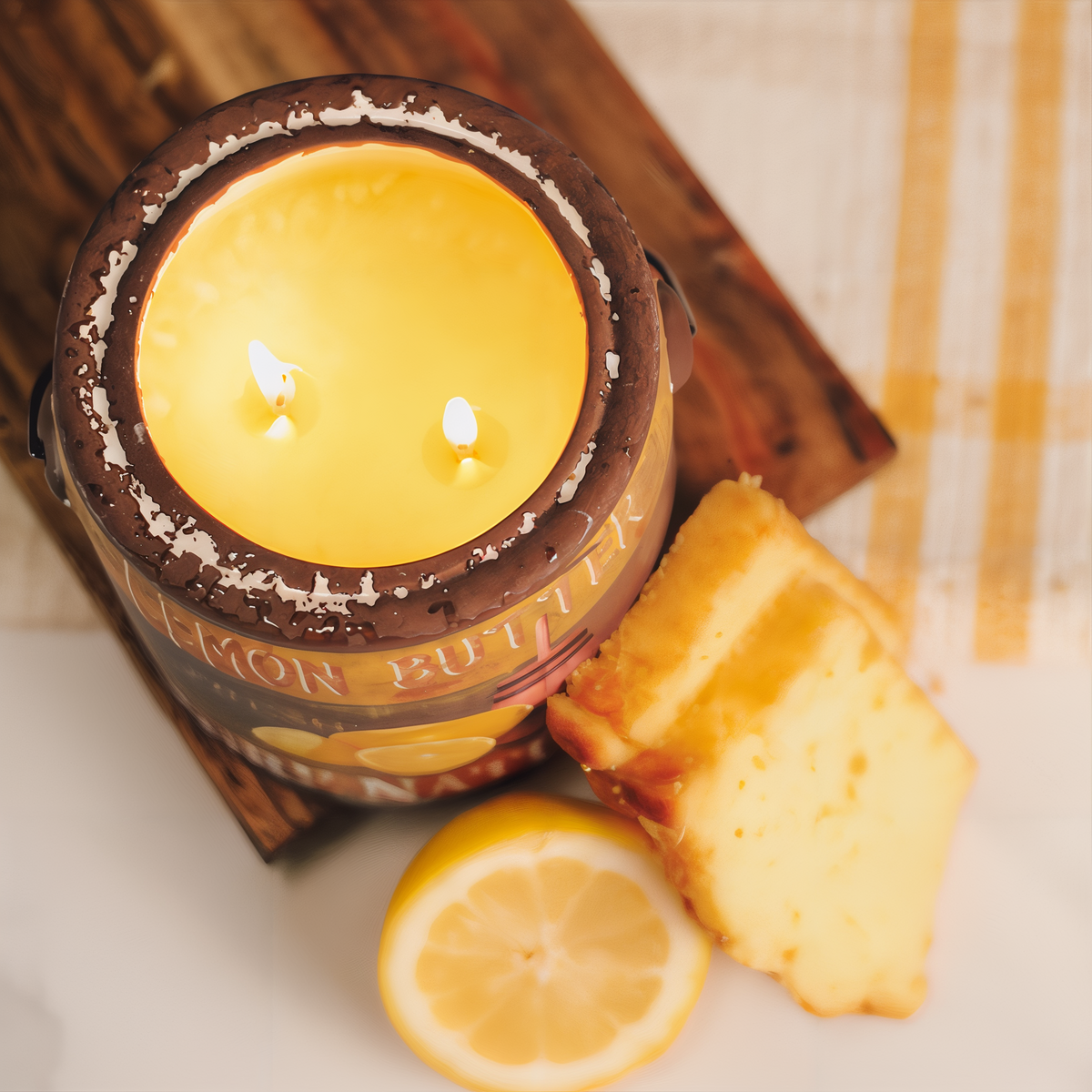 A Cheerful Giver Lemon Butter Farm Fresh Candle -- styled scene