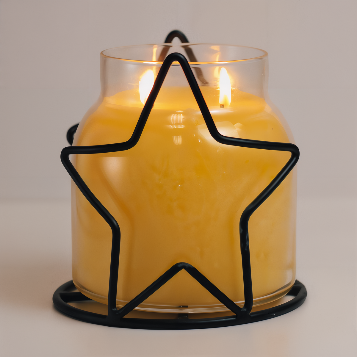 A Cheerful Giver Star Candle Jar Holder -- styled scene with candle