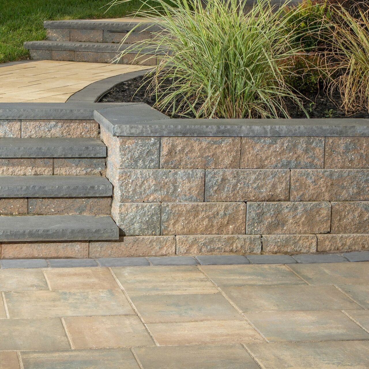 Belgard Terrace Wall built into a backyard seat wall and steps