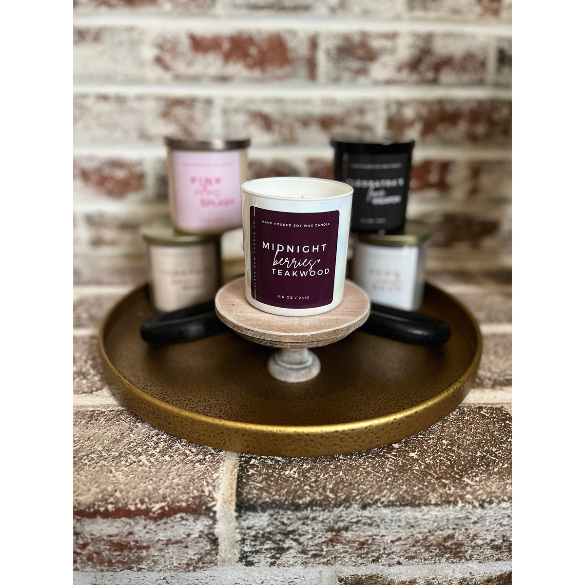 Black Bow Candle Co. Midnight Berries + Teakwood 17 oz 3-Wick Soy Candle -- lifestyle styled scene with scent collection