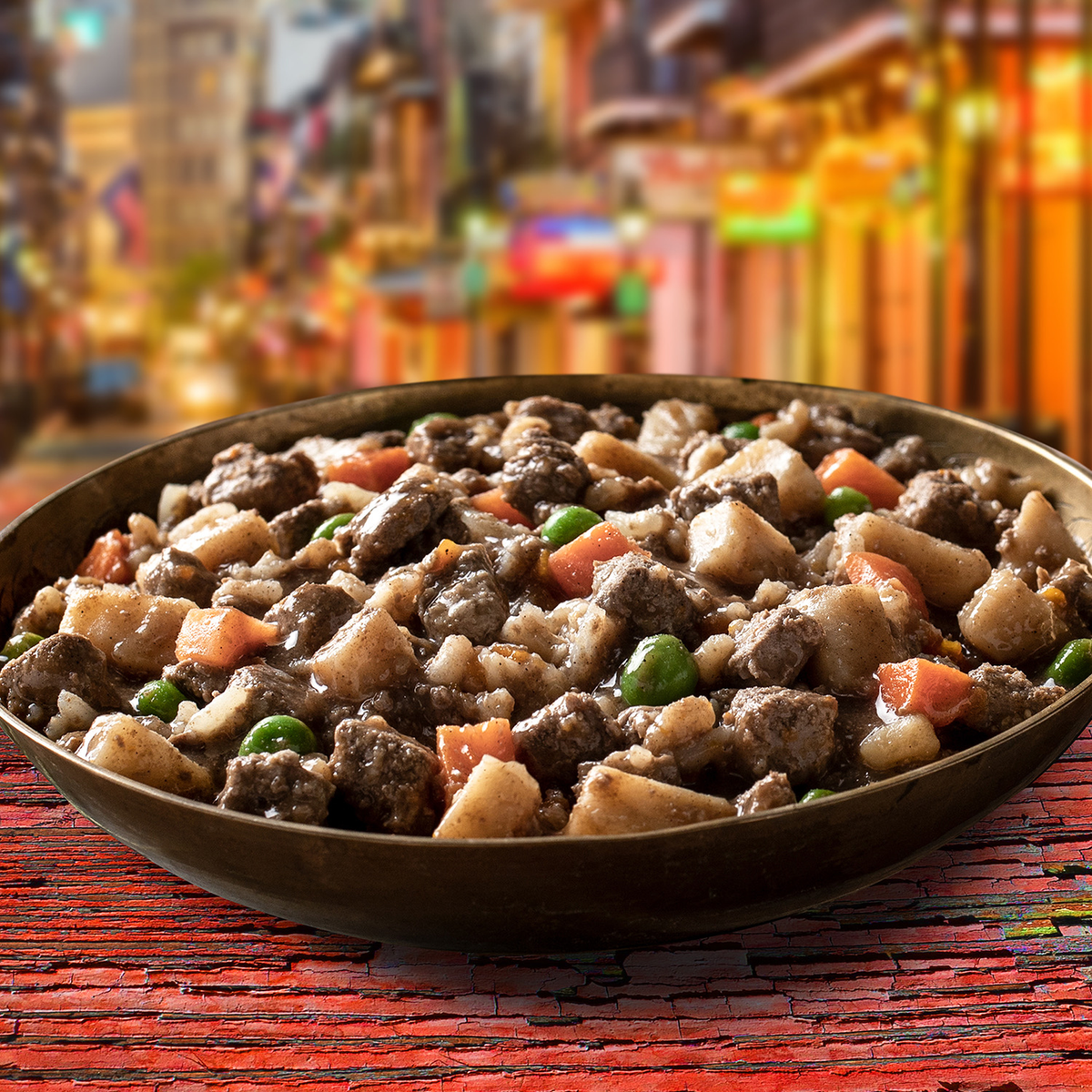 Fromm Frommbalaya Beef, Vegetable, & Rice Stew Wet Dog Food -- stew served in a bowl with beef