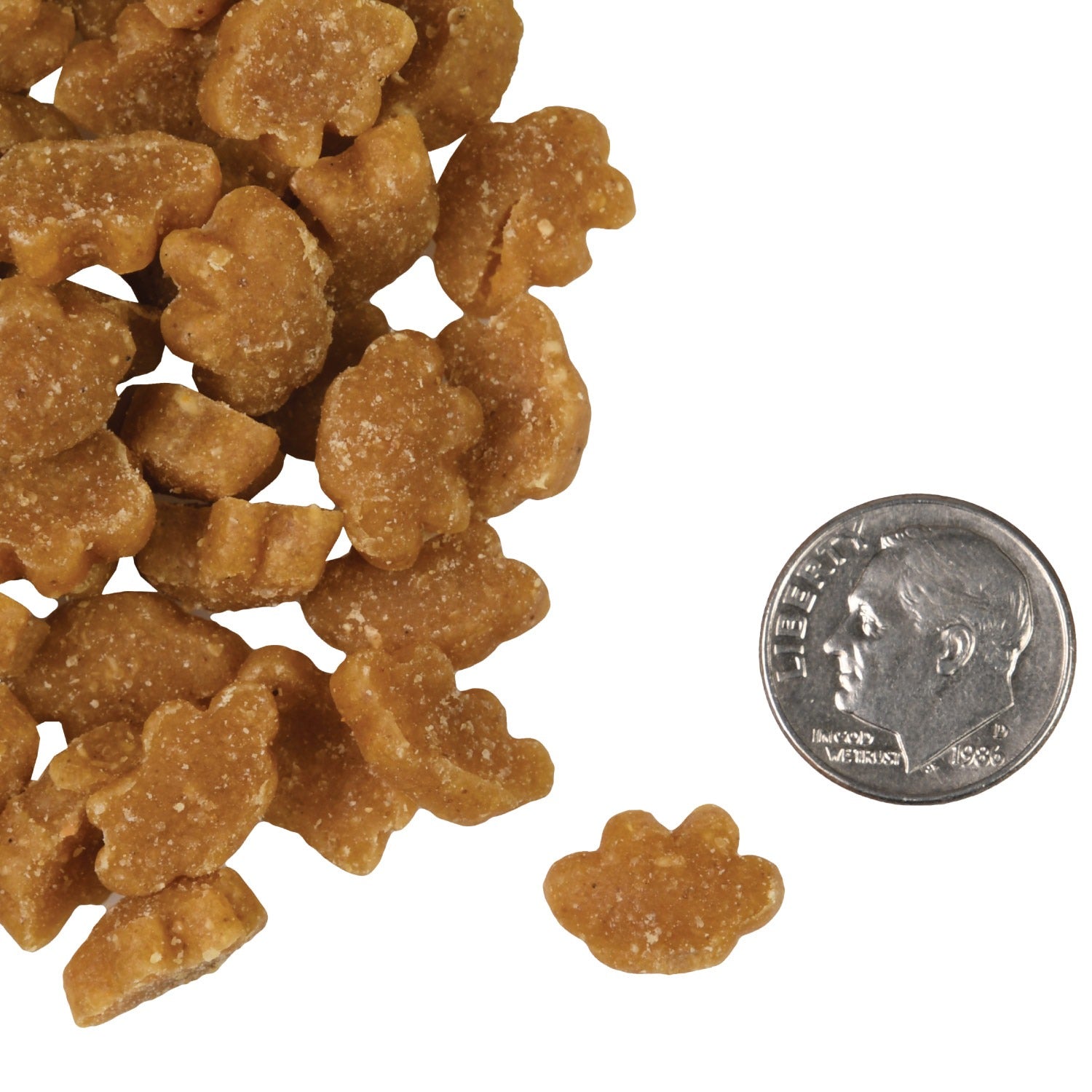 PurrSnackitty chicken Snackitties beside a dime to show the small paw-shaped treat size