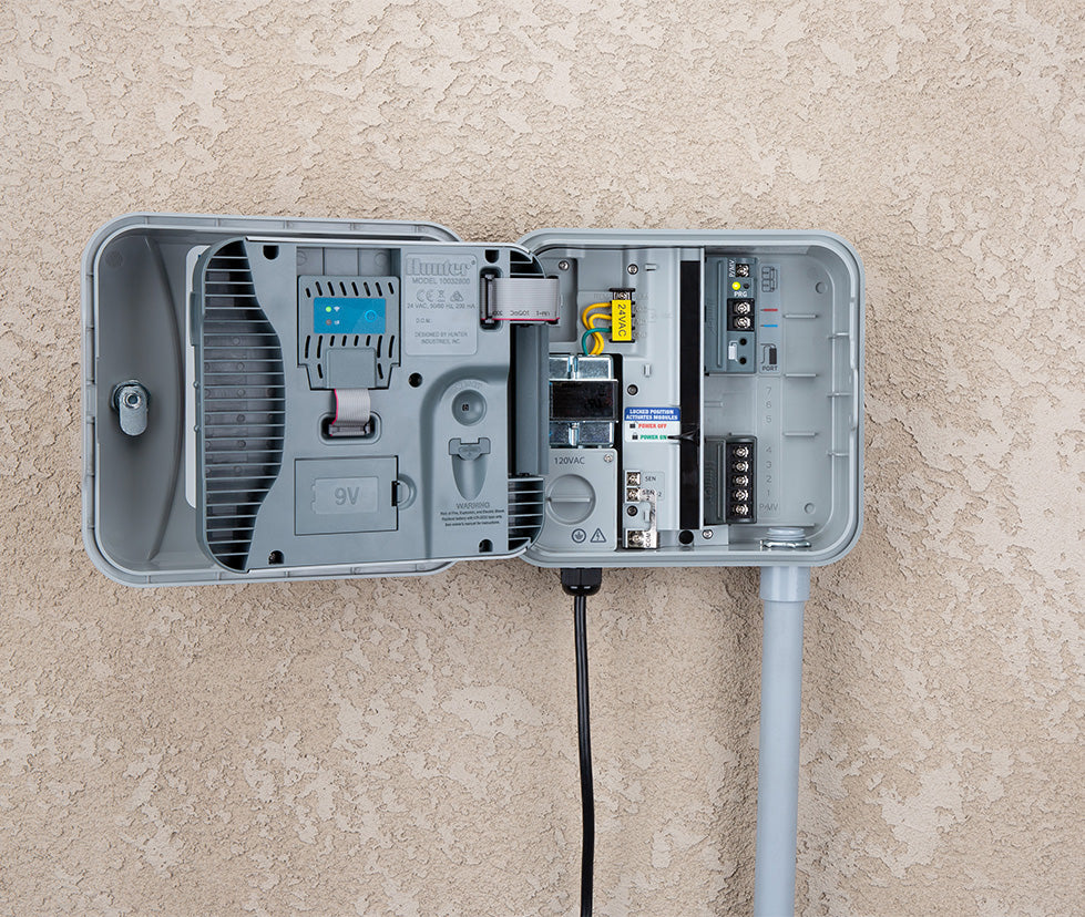 Hunter P2C-400 Pro-C controller wiring compartment with PC-WIFI module slot, 9 V battery bay, and modular expansion area visible