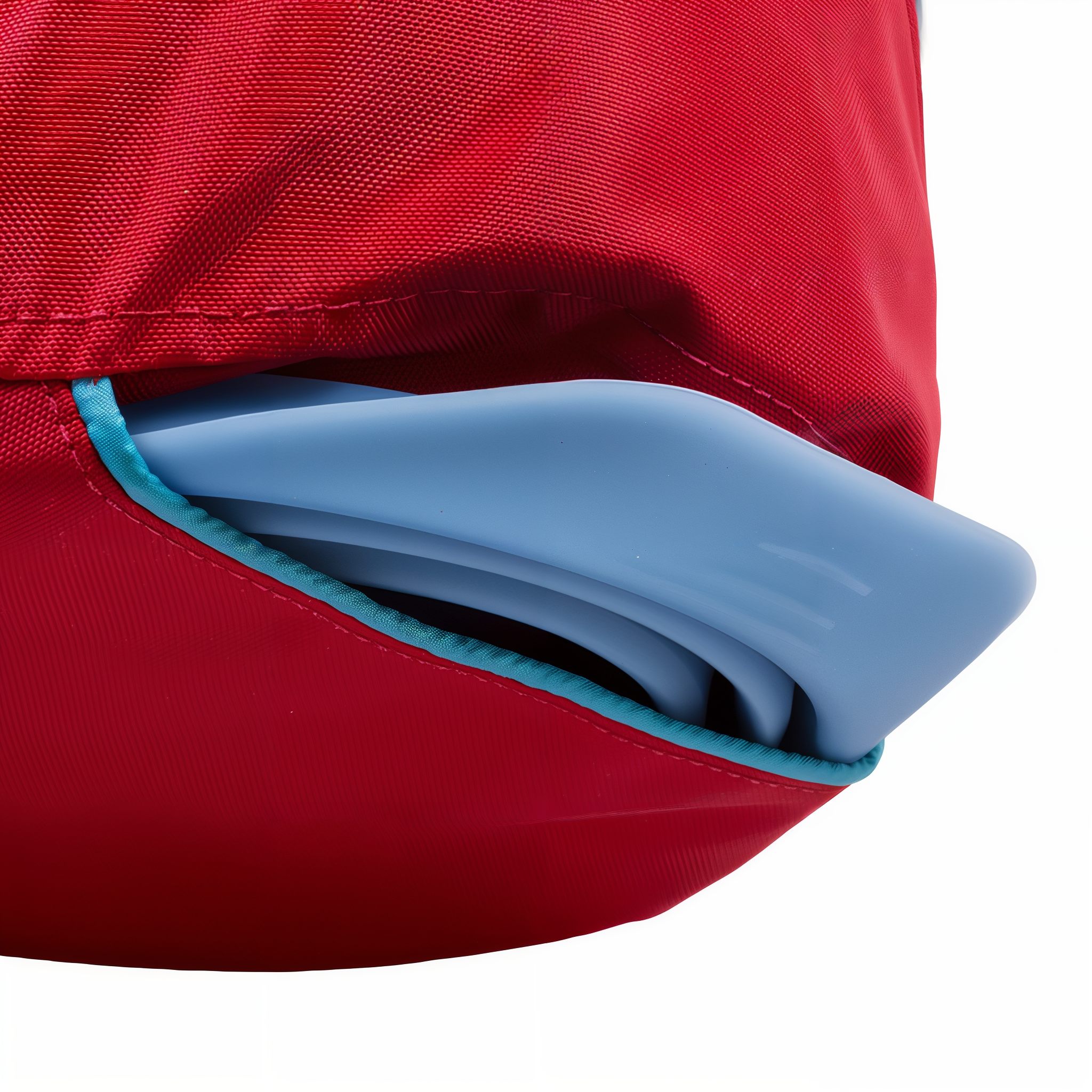 Collapsible bowl tucked into the bottom pocket of the Kurgo Kibble Carrier