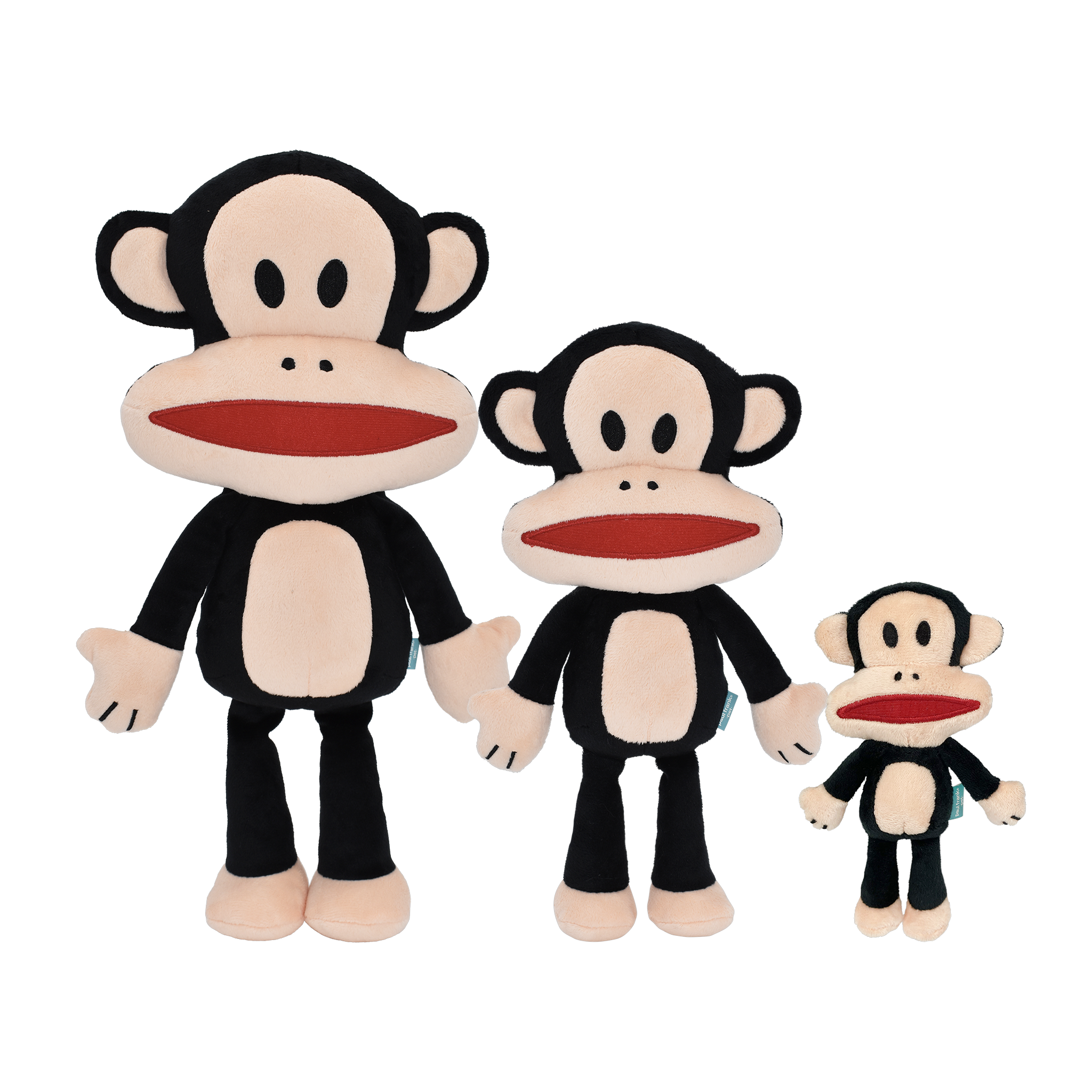 Paul Frank Julius plush dog toy line shown in 18 inch, 12 inch, and 6 inch sizes for scale