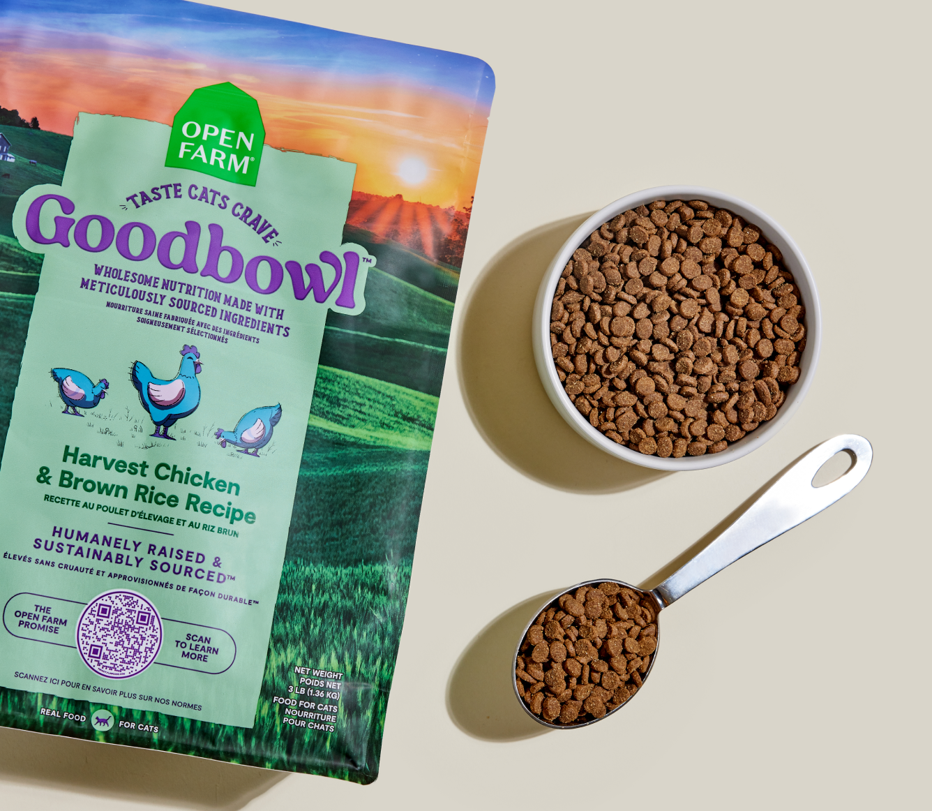 Open Farm Goodbowl Harvest Chicken & Brown Rice Cat Kibble kibble in a bowl with a serving scoop