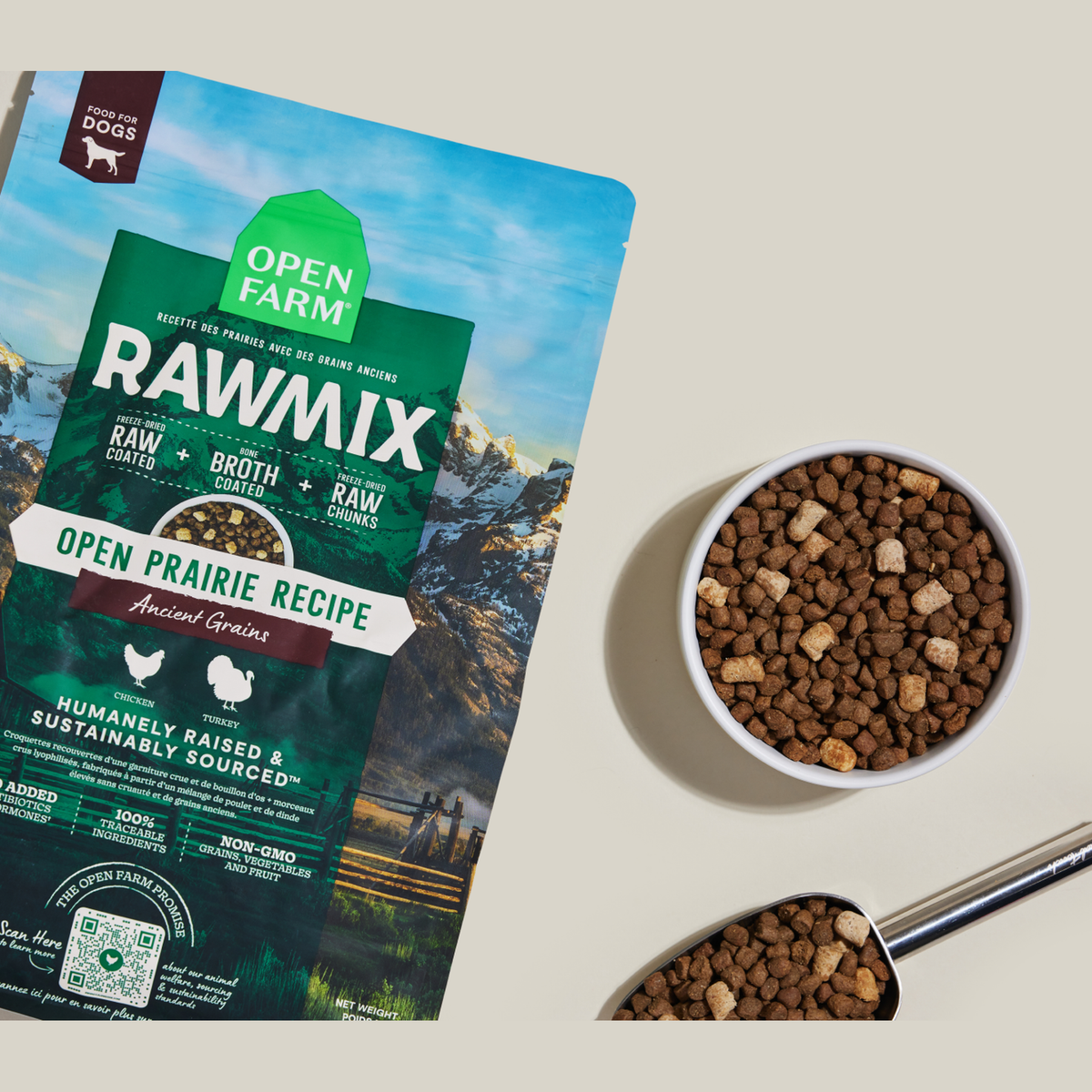 Open Farm RawMix Open Prairie Ancient Grains Dog Kibble -- bag with a bowl of kibble