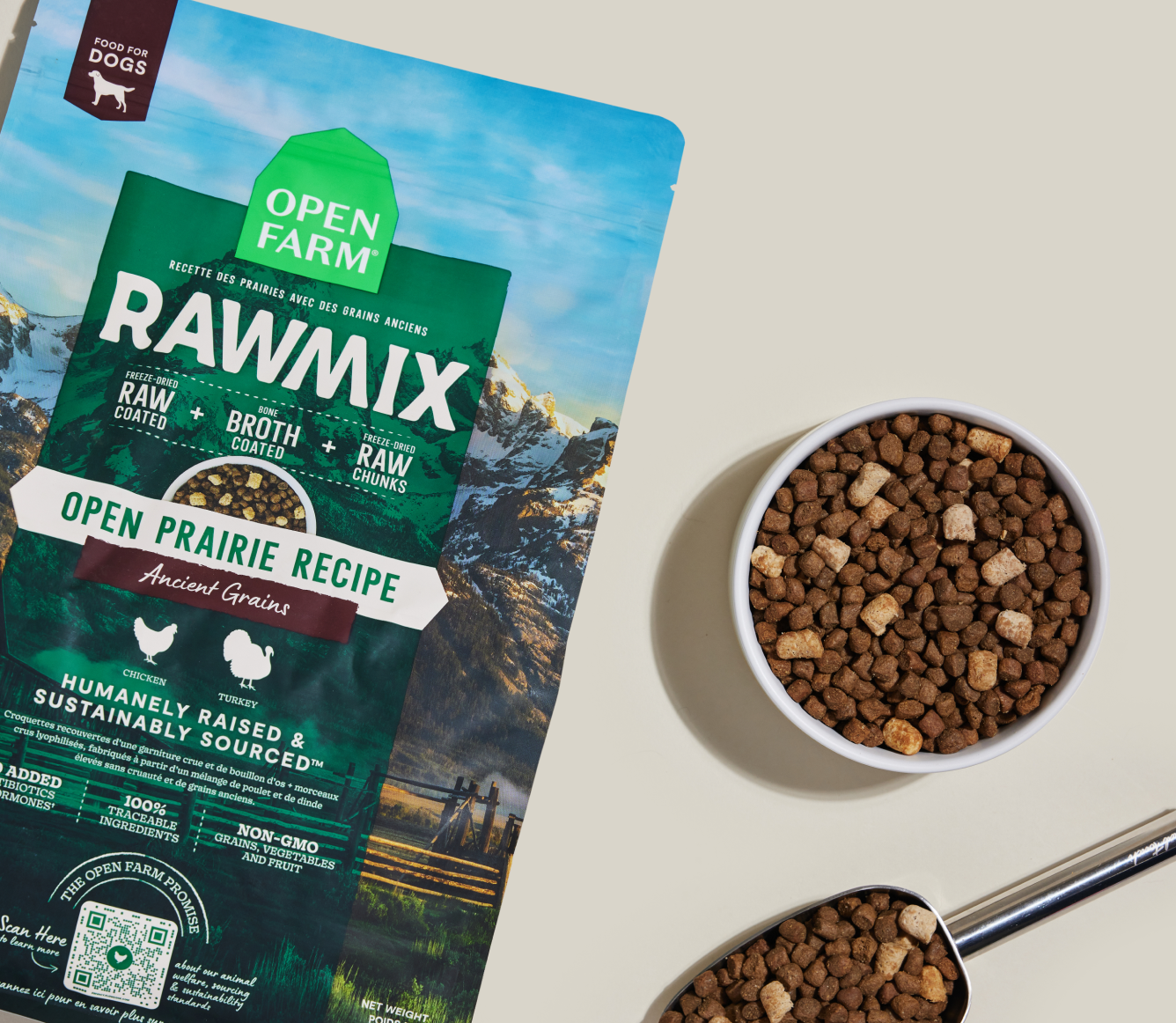 Open Farm RawMix Open Prairie Ancient Grains Dog Kibble bag with a bowl of kibble