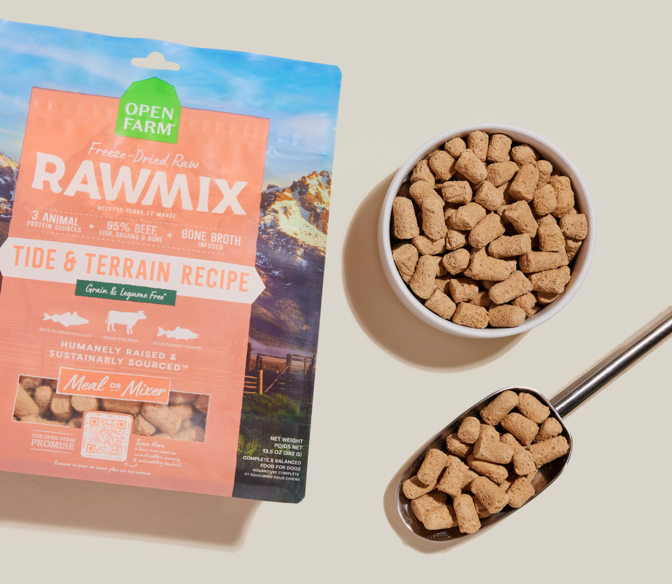 Open Farm RawMix Tide & Terrain freeze dried morsels in a bowl and measuring scoop