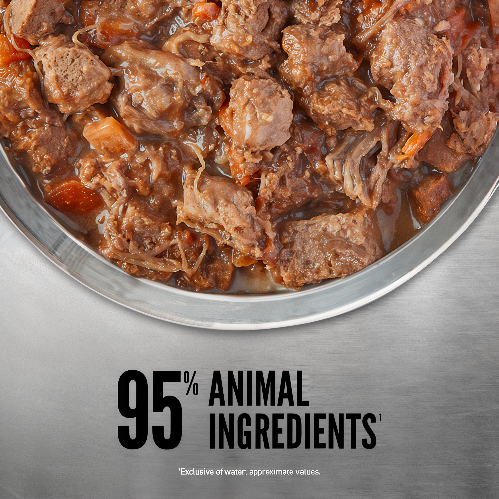 Bowl of ORIJEN Regional Red Stew showing chunks and shreds of beef and lamb with carrots in savory gravy