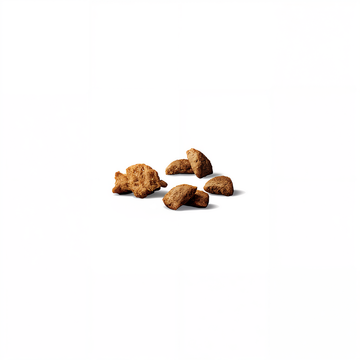 Close-up of Pro Plan Complete Essentials crunchy kibble and tender shredded pieces