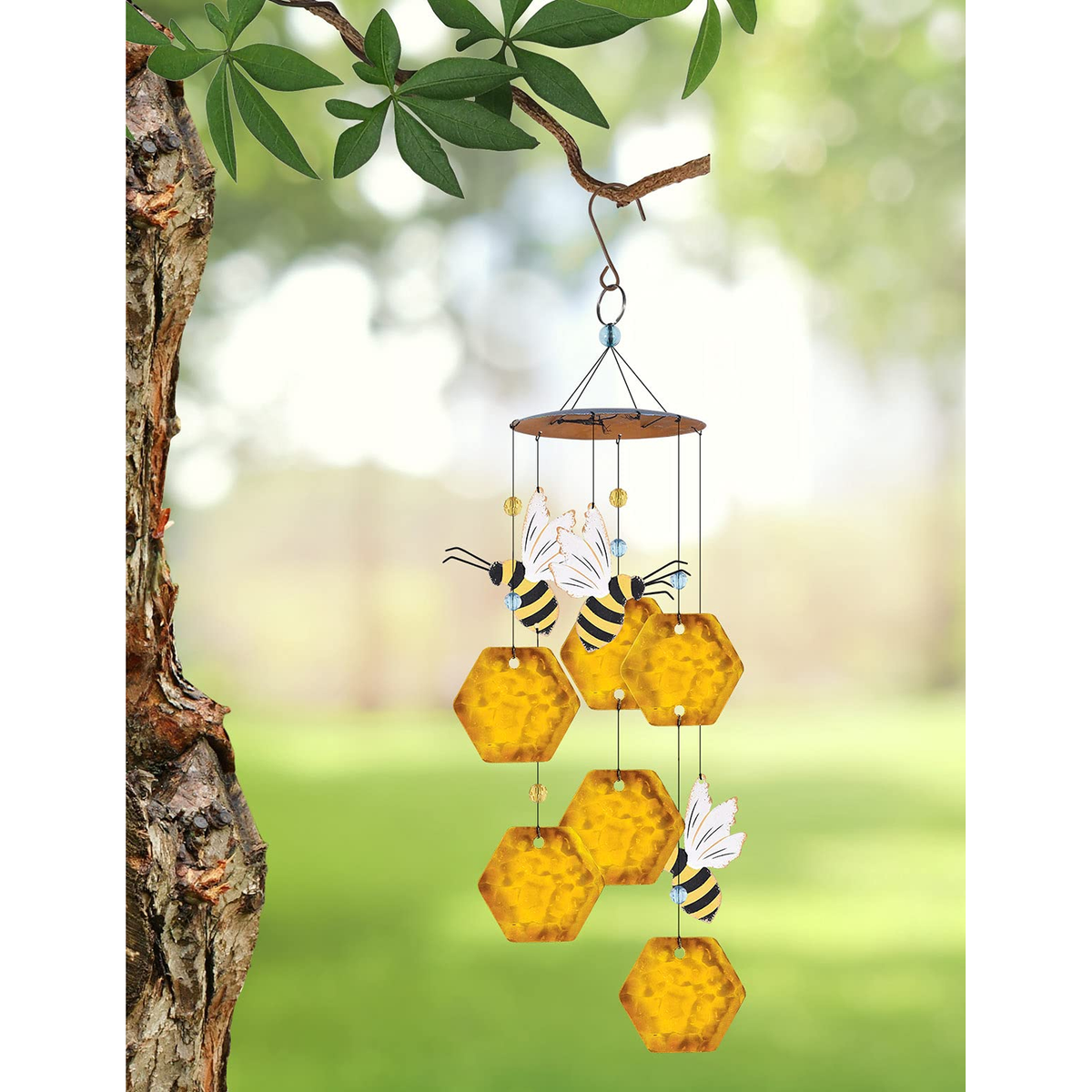 Sunset Vista Designs Honeybee Honeycomb Wind Chime -- shown hanging from a tree branch