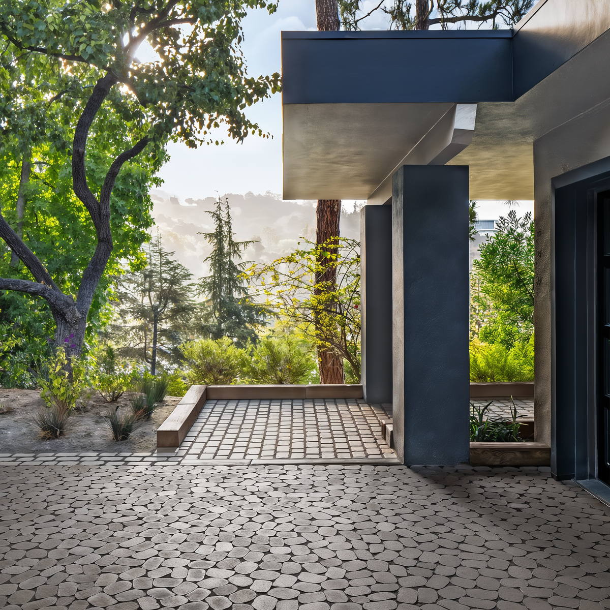 Antika Paver Onyx Black Aged driveway with random modular pa.
