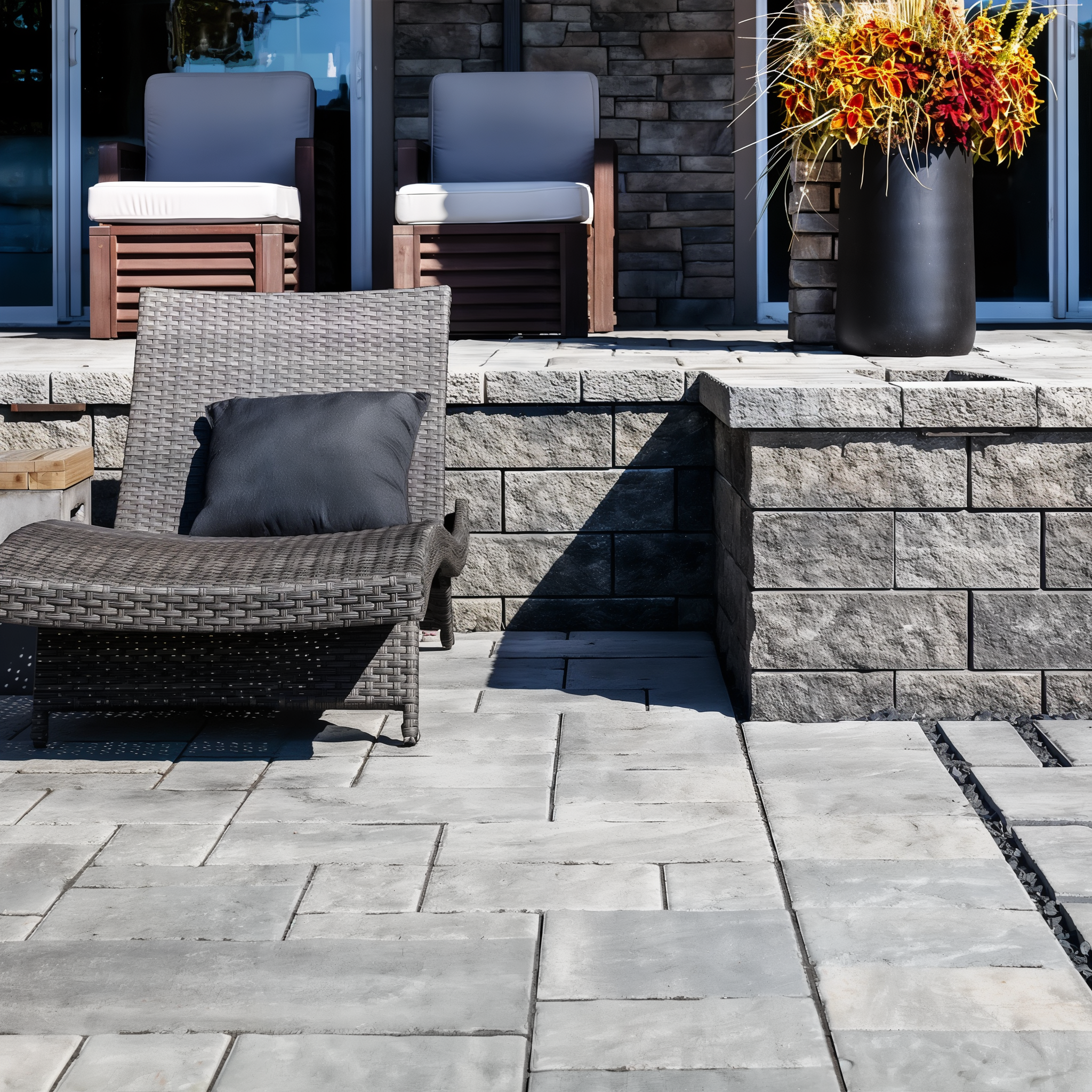 Techo-Bloc Semma Wall Champlain Grey walls framing a spa terrace.