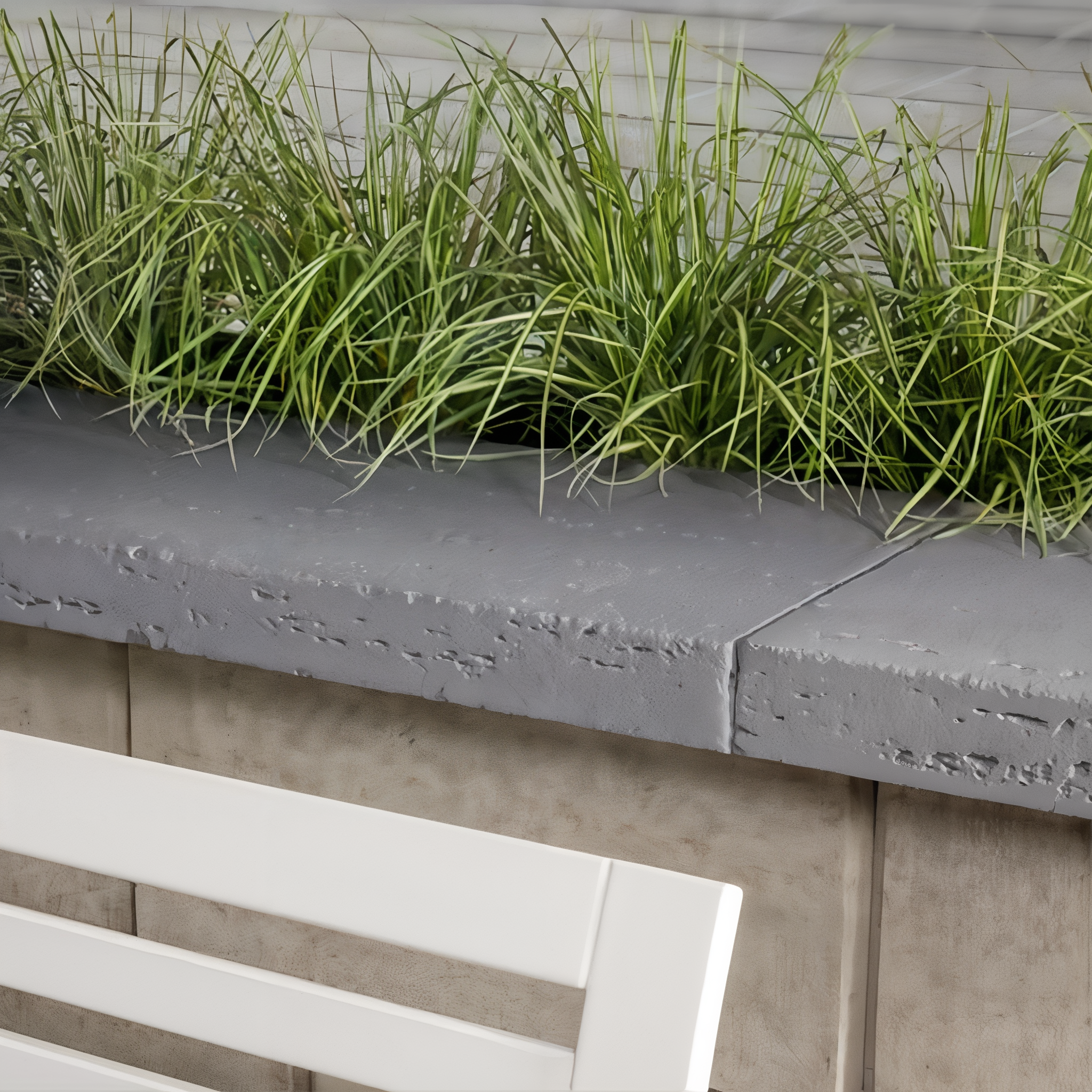 Travertina Raw Cap Ivory, single size Klean-Bloc Raw Travertine in Rock Garden Brown.