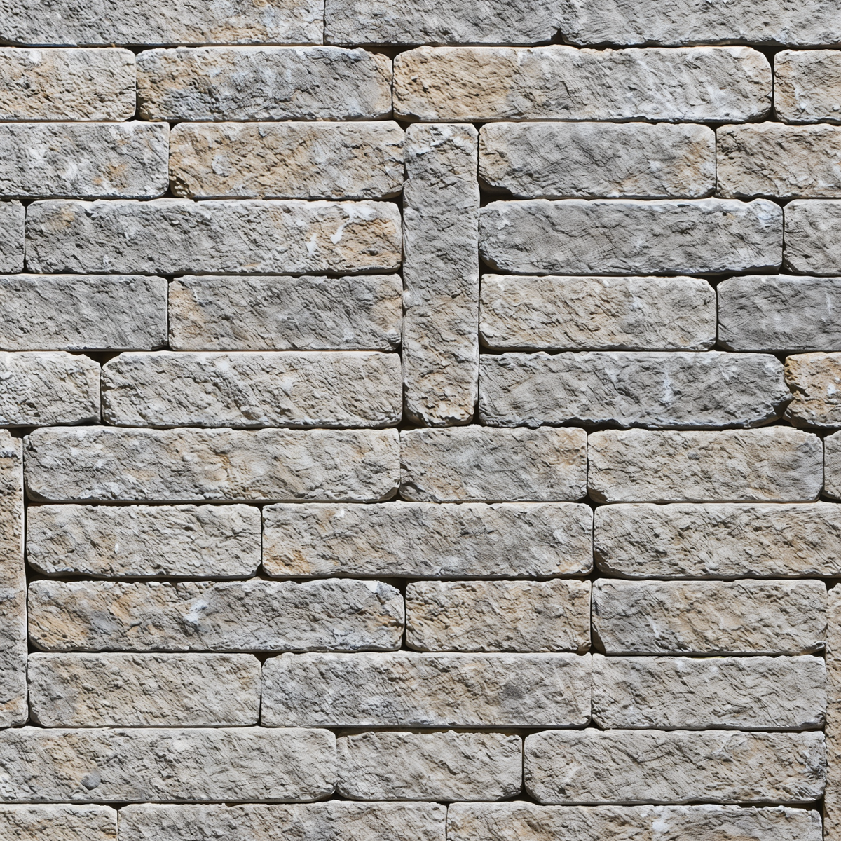 Close-up of the Valencia Fire Pit in Champlain Grey with split face texture.
