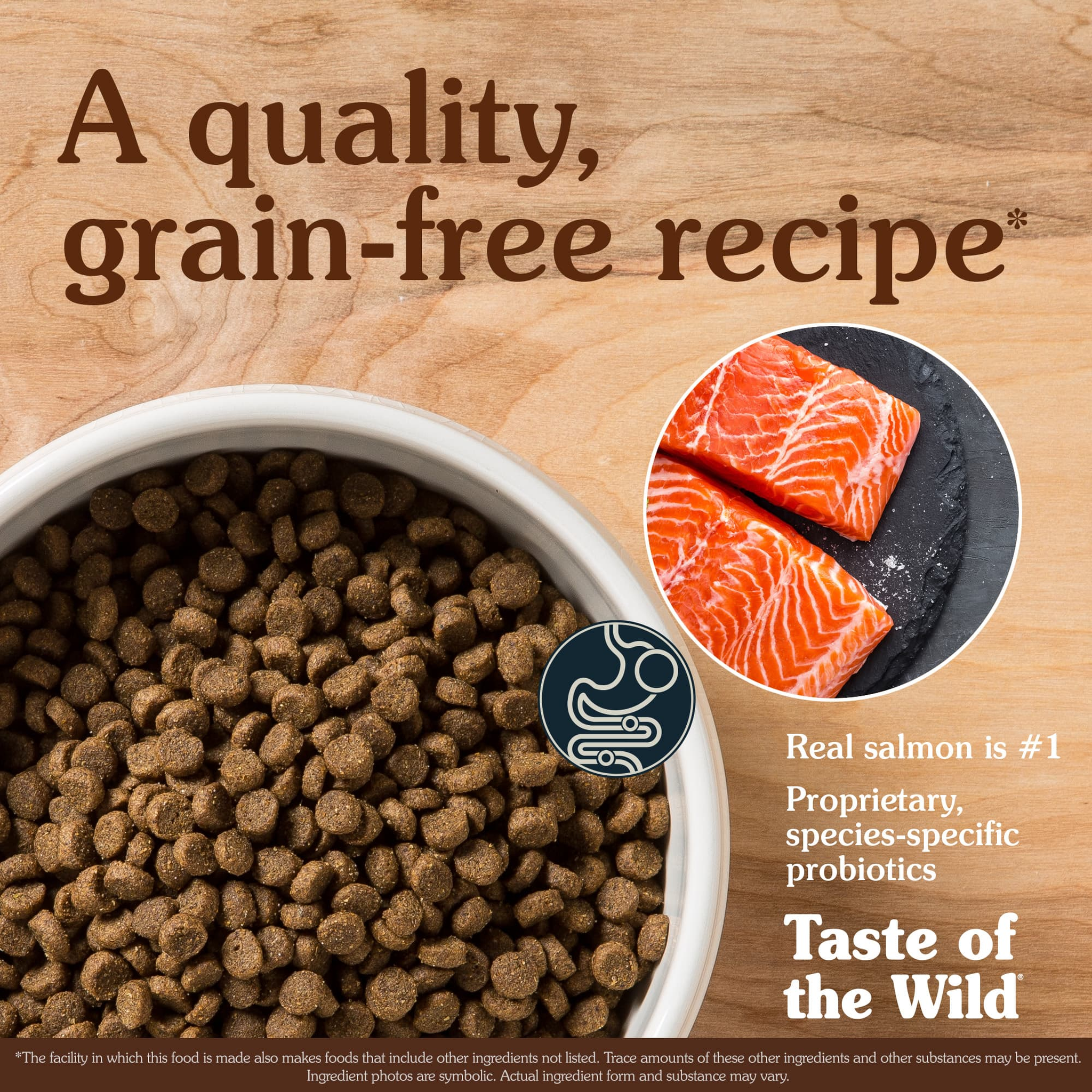 Bowl of quality grain-free puppy kibble with real salmon as the number one ingredient beside fresh salmon fillets