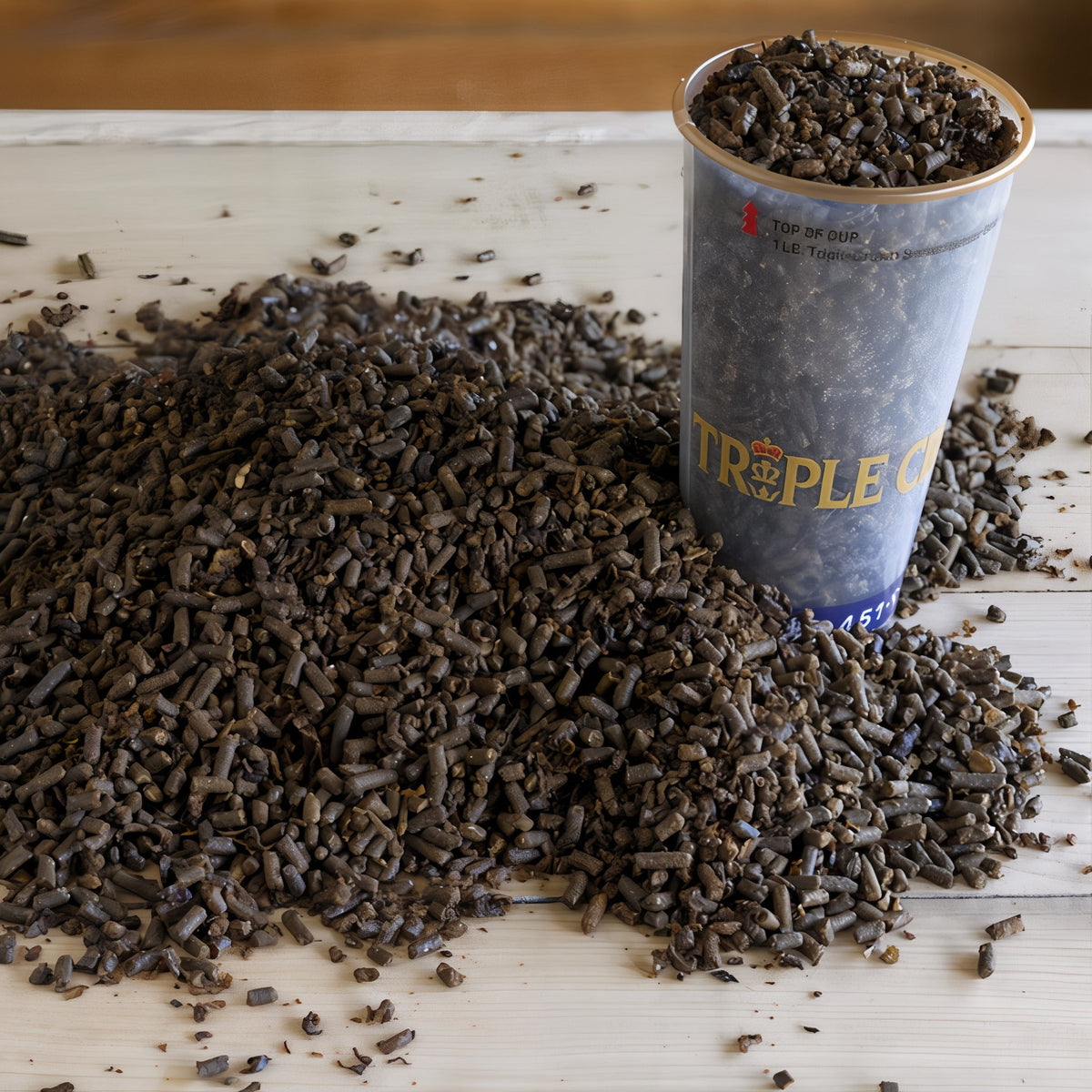 Close-up of Triple Crown Senior beet pulp based feed with a measuring cup