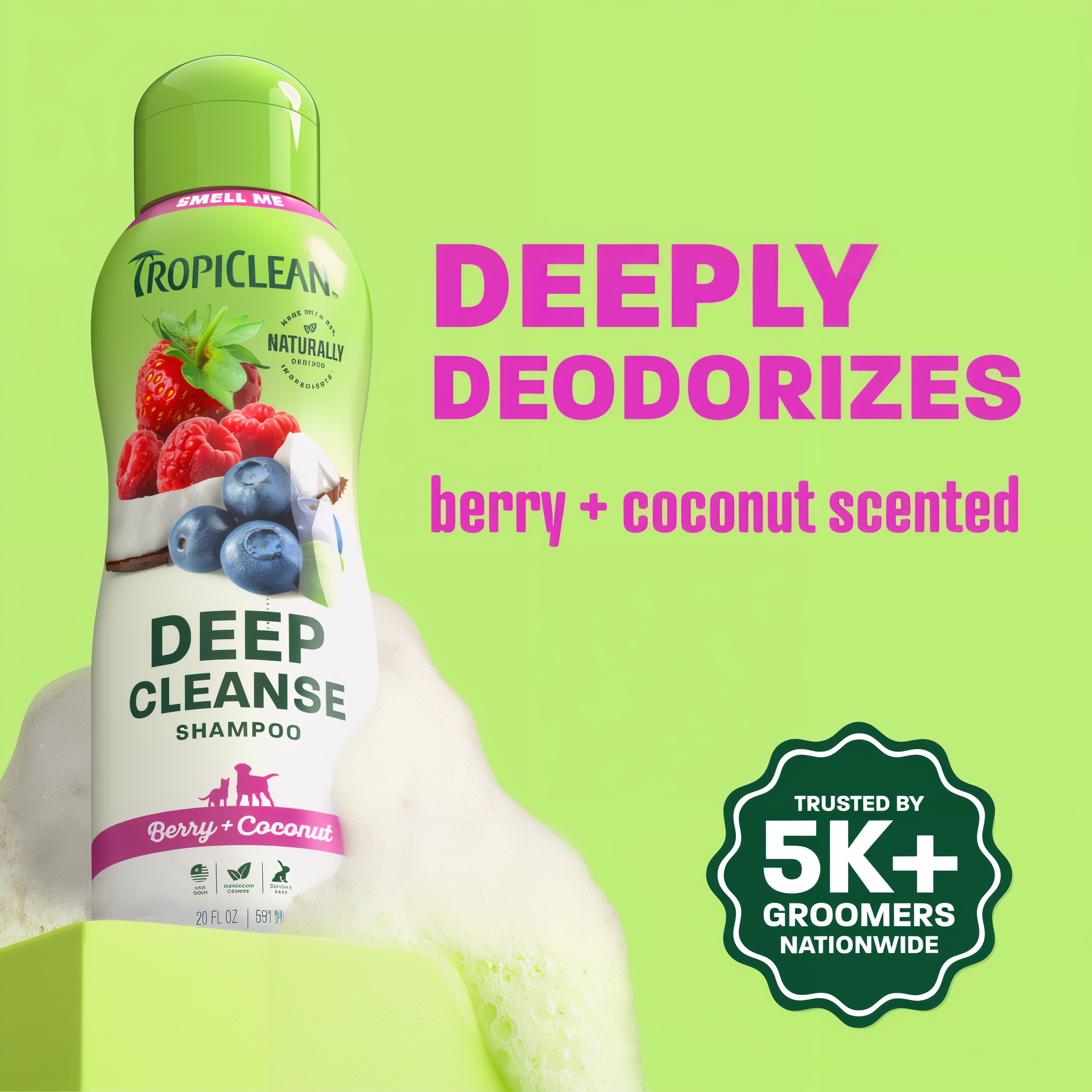 TropiClean berry shampoo bottle on light green background.