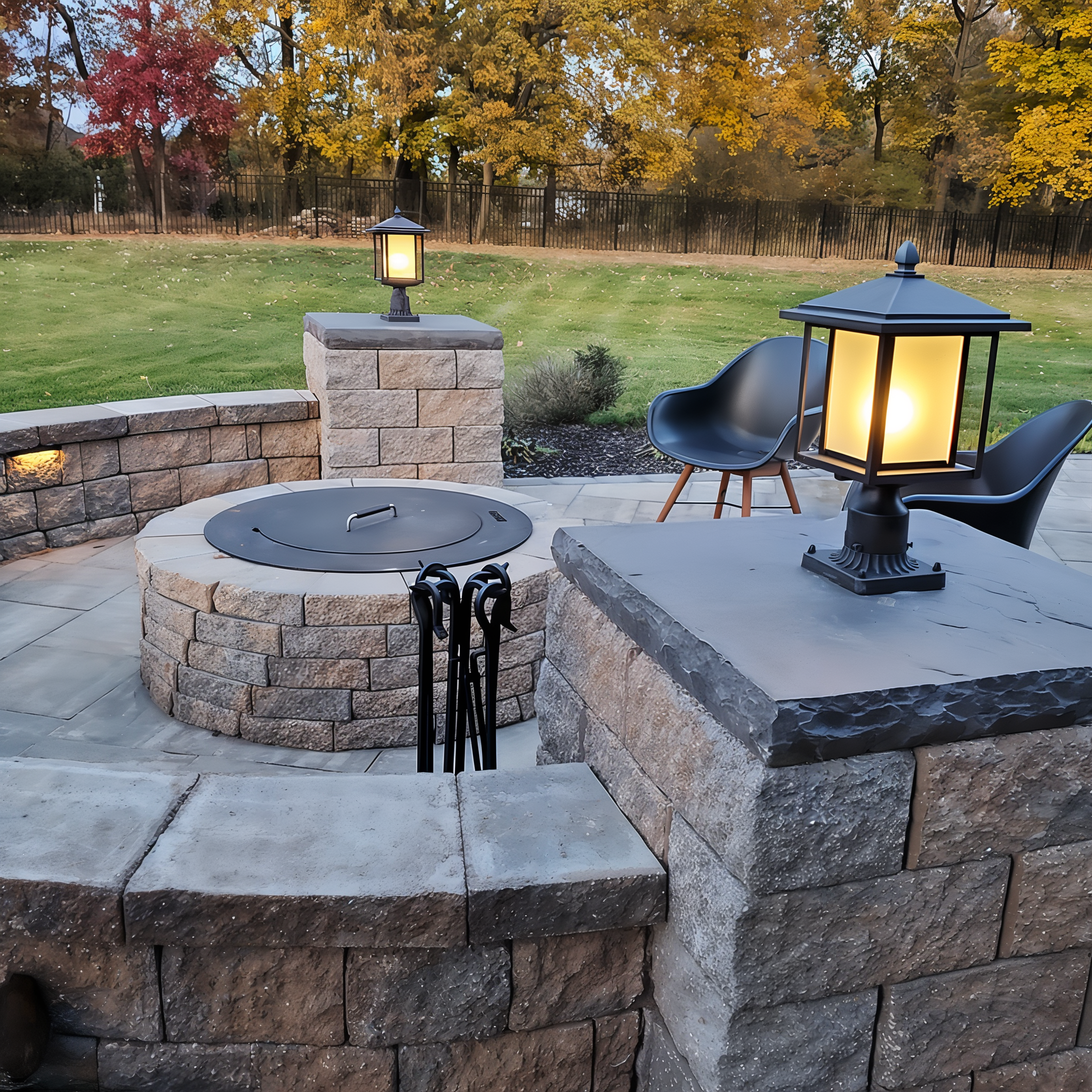 Tru-Scapes Modern Pillar Light TS-PL101 — autumn pair framing fire pit on stamped concrete