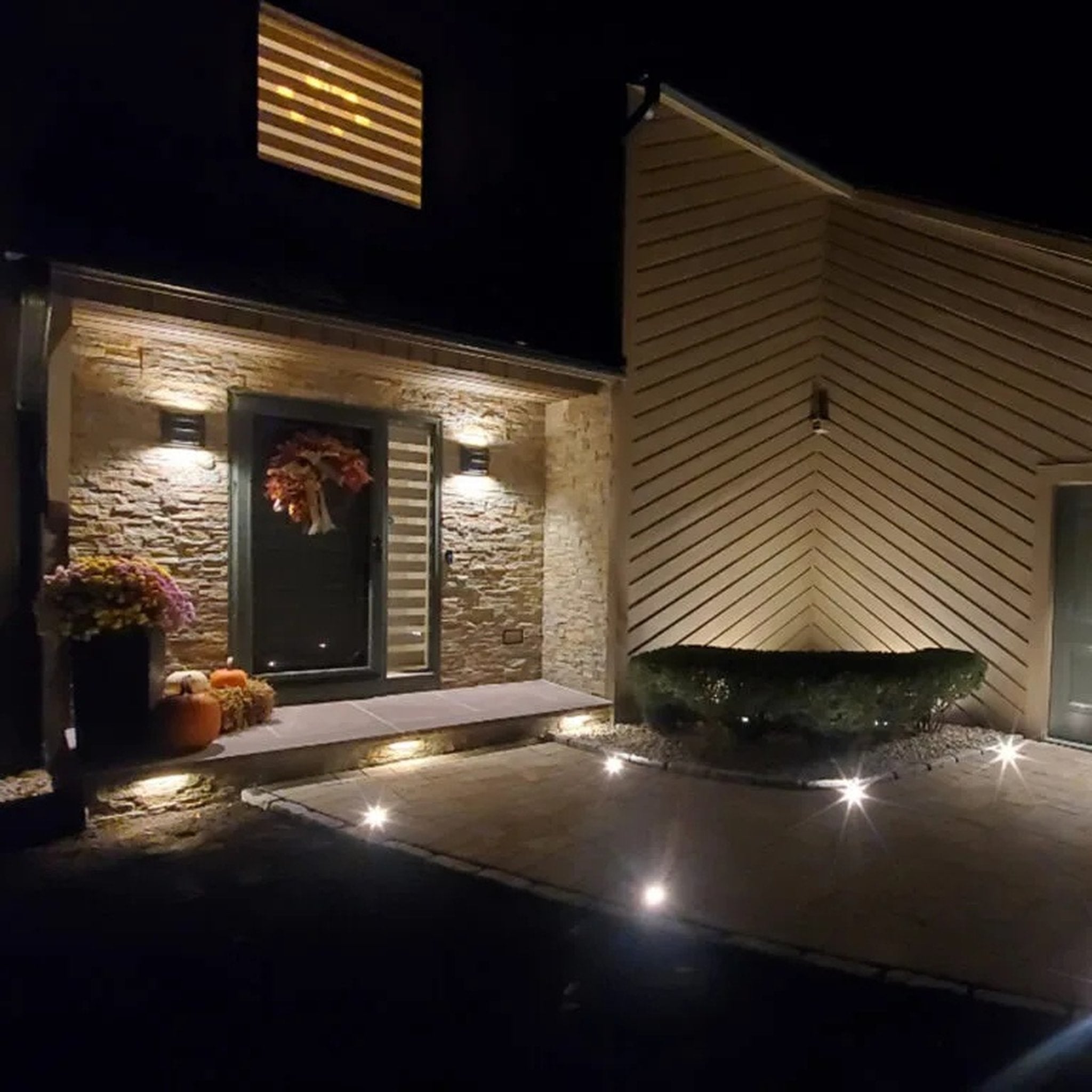 Tru-Scapes Modern 1.5" Dot Light installed in hardscape — landscape lighting view #Stainless Steel#4000K#1 1/2"