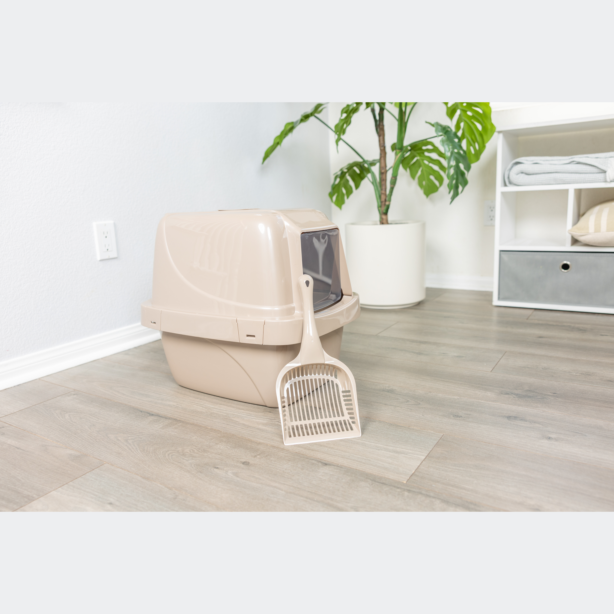 Van Ness Giant Litter Scoop stored beside a Van Ness enclosed cat pan